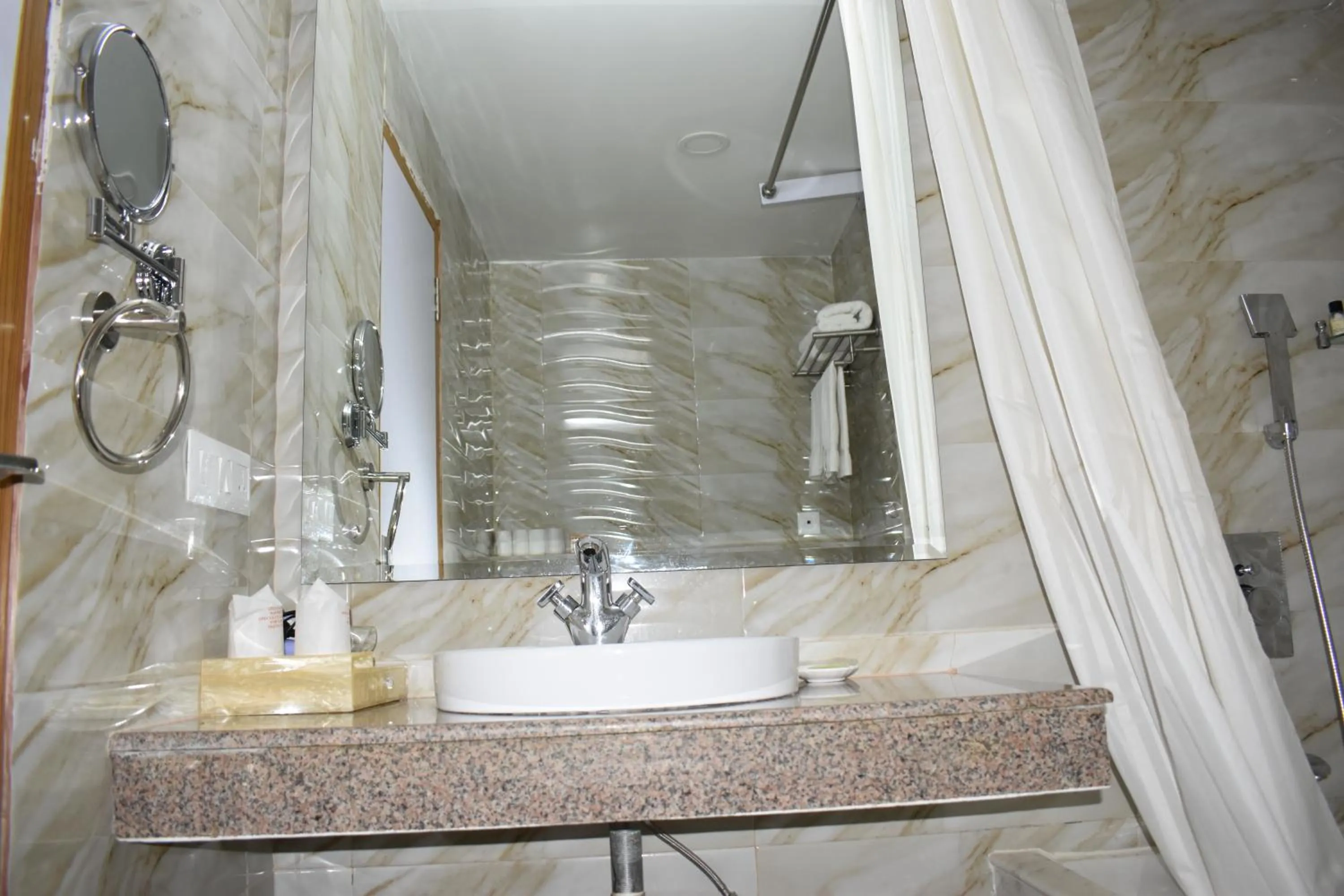 Bathroom in HOTEL ANAND INTERNATIONAL