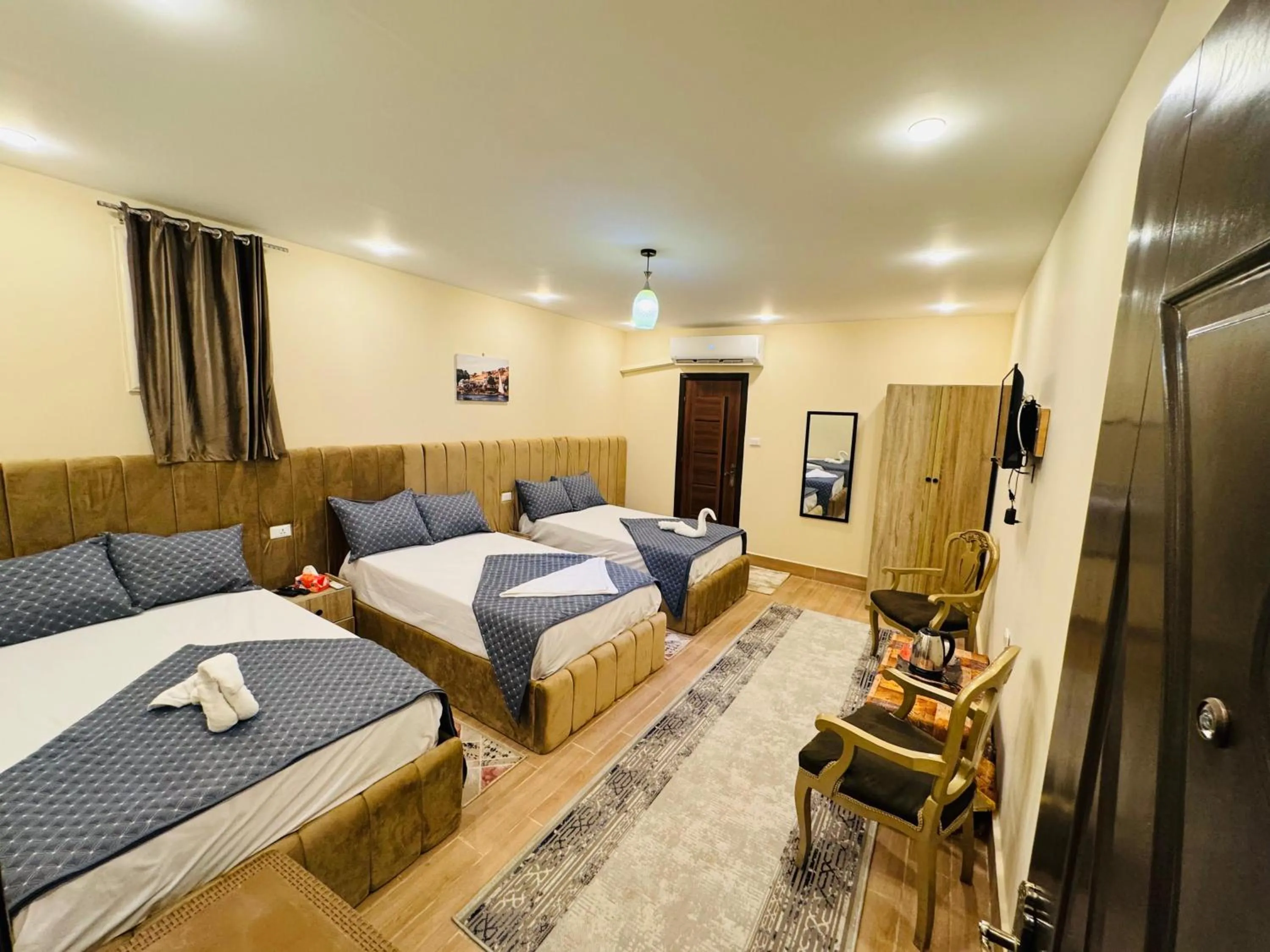 Bed in Sphinx palace pyramids view inn