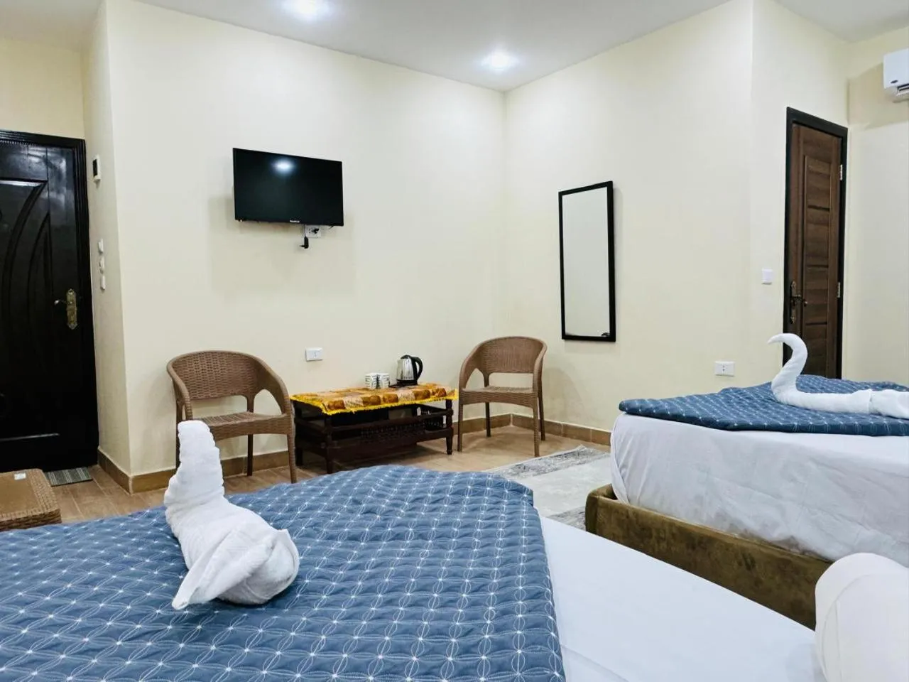 Bed in Sphinx palace pyramids view inn