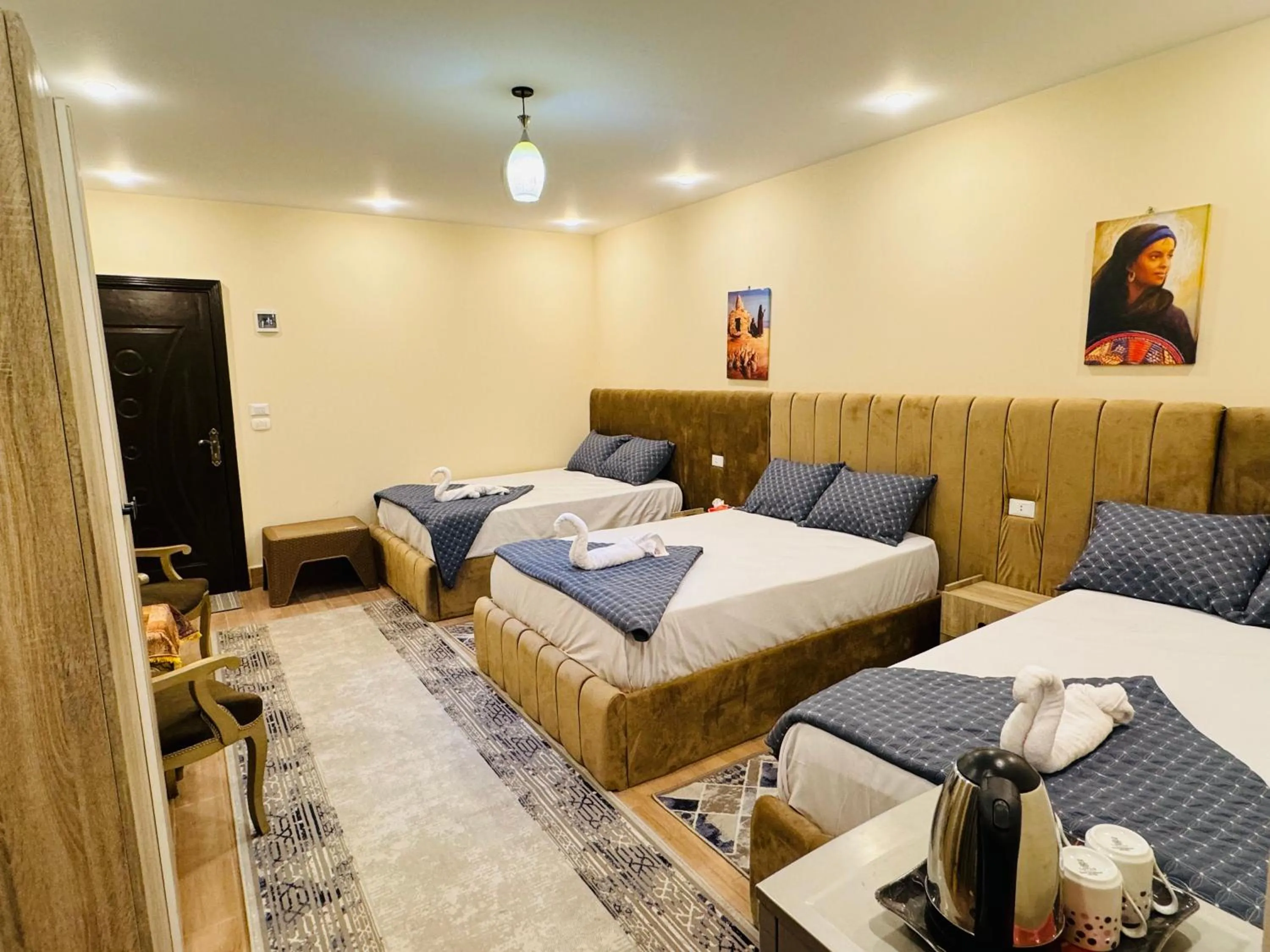 Bed in Sphinx palace pyramids view inn