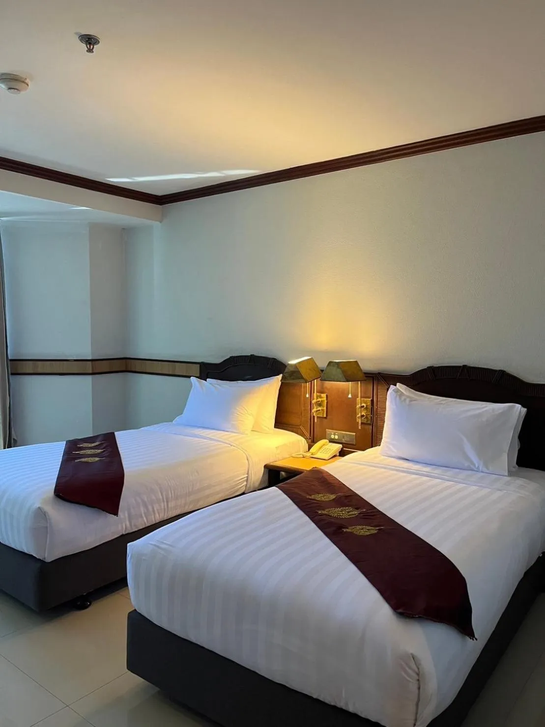 Bed in Suntara Wellness Resort & Hotel