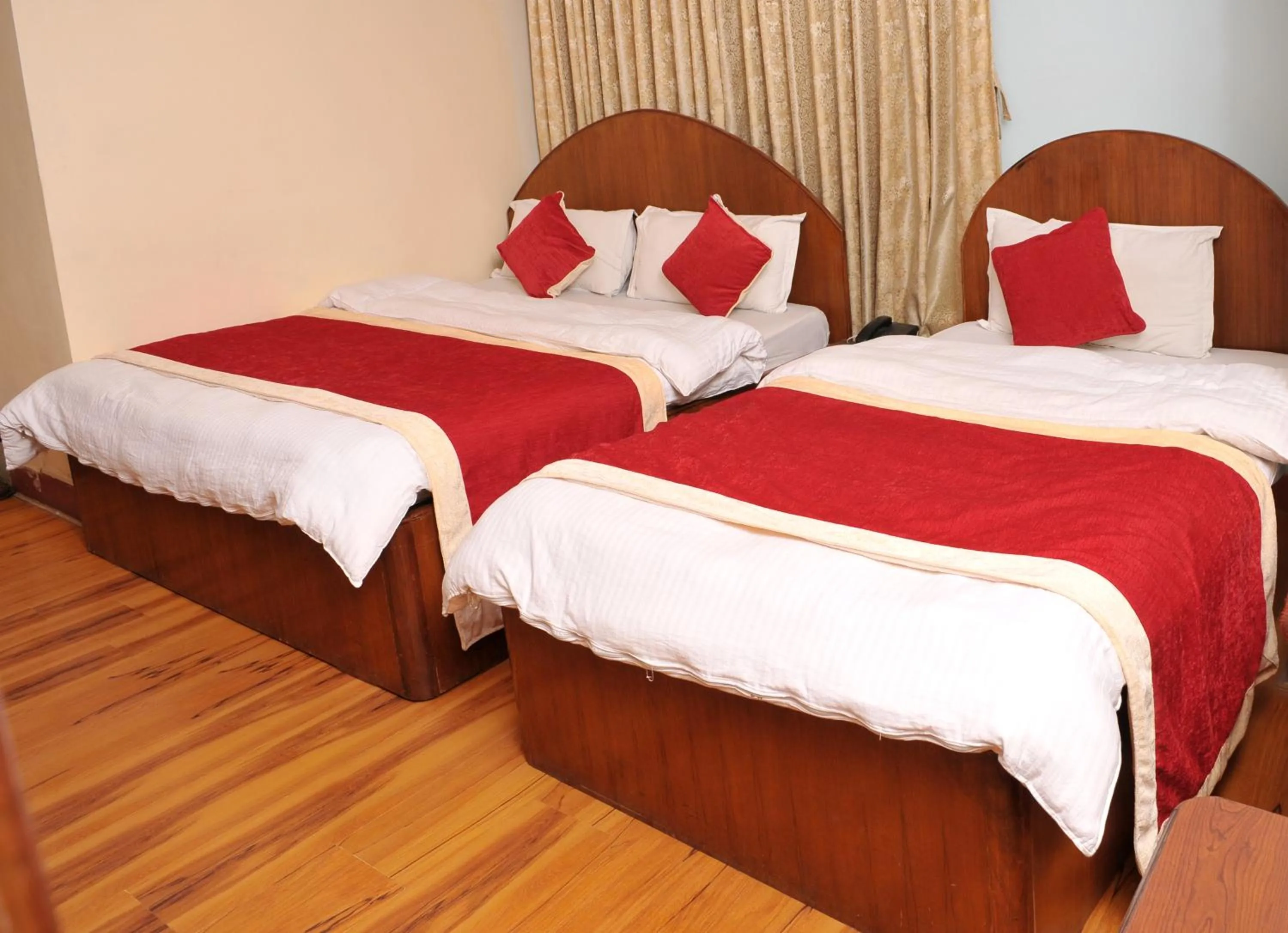 Photo of the whole room, Bed in Hotel Brihaspati