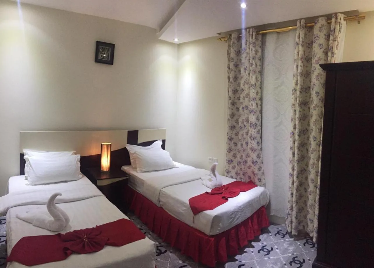 Bed in Merfal Hotel Apartments Al Taawan