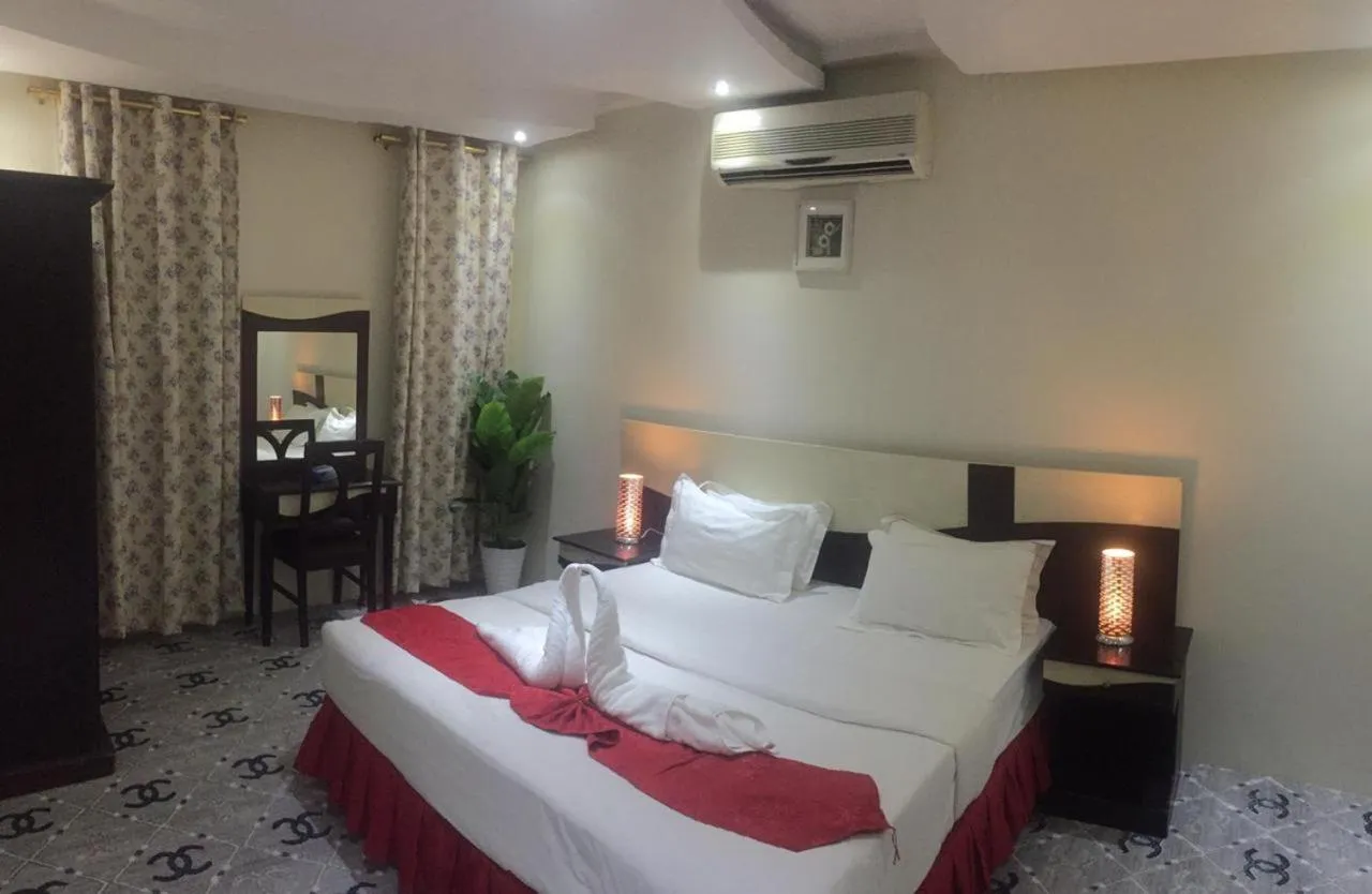 Bed in Merfal Hotel Apartments Al Taawan