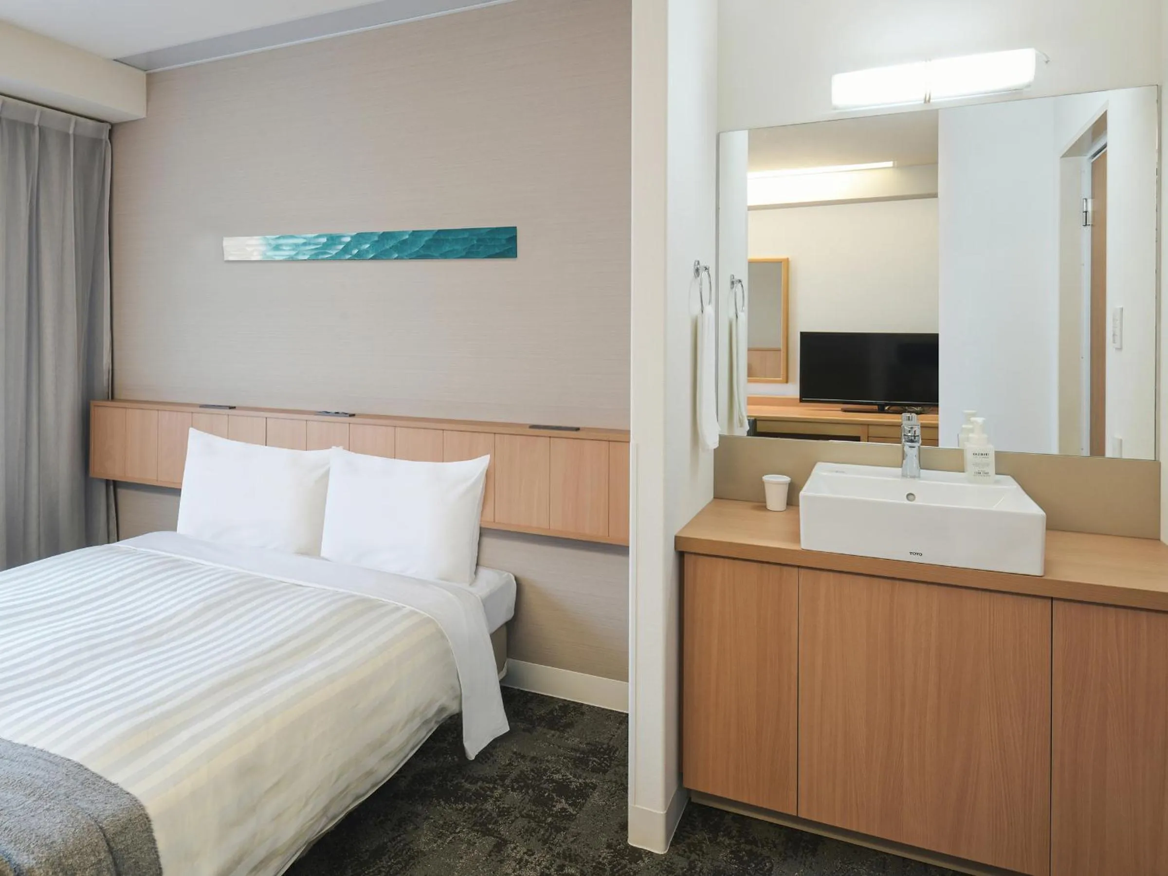 Bed in Vessel Hotel Ishigakijima