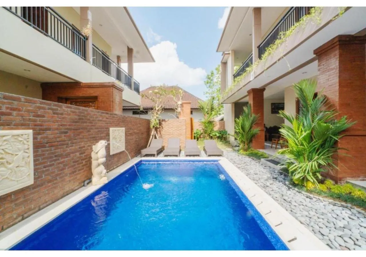 Swimming pool in Komala Homestay