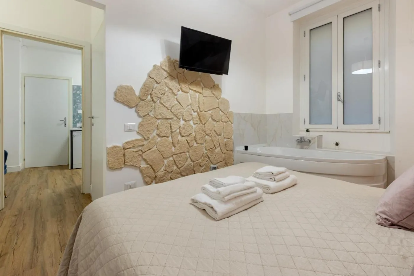 Bed in Fior Di Loto Rooms