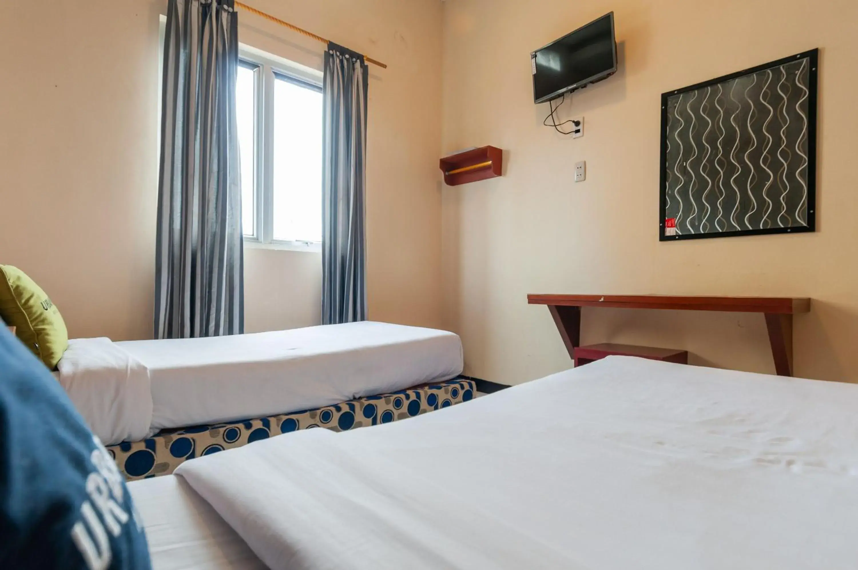 Superior Twin Room in Urbanview Hotel Syariah Residence Medan by RedDoorz Superior Twin Room in Urbanview Hotel Syariah Residence Medan by RedDoorz