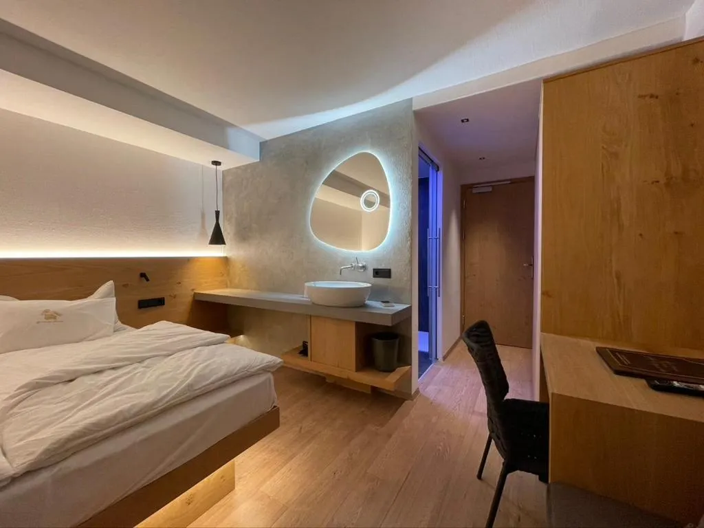 Bed in Hotel Des Alpes