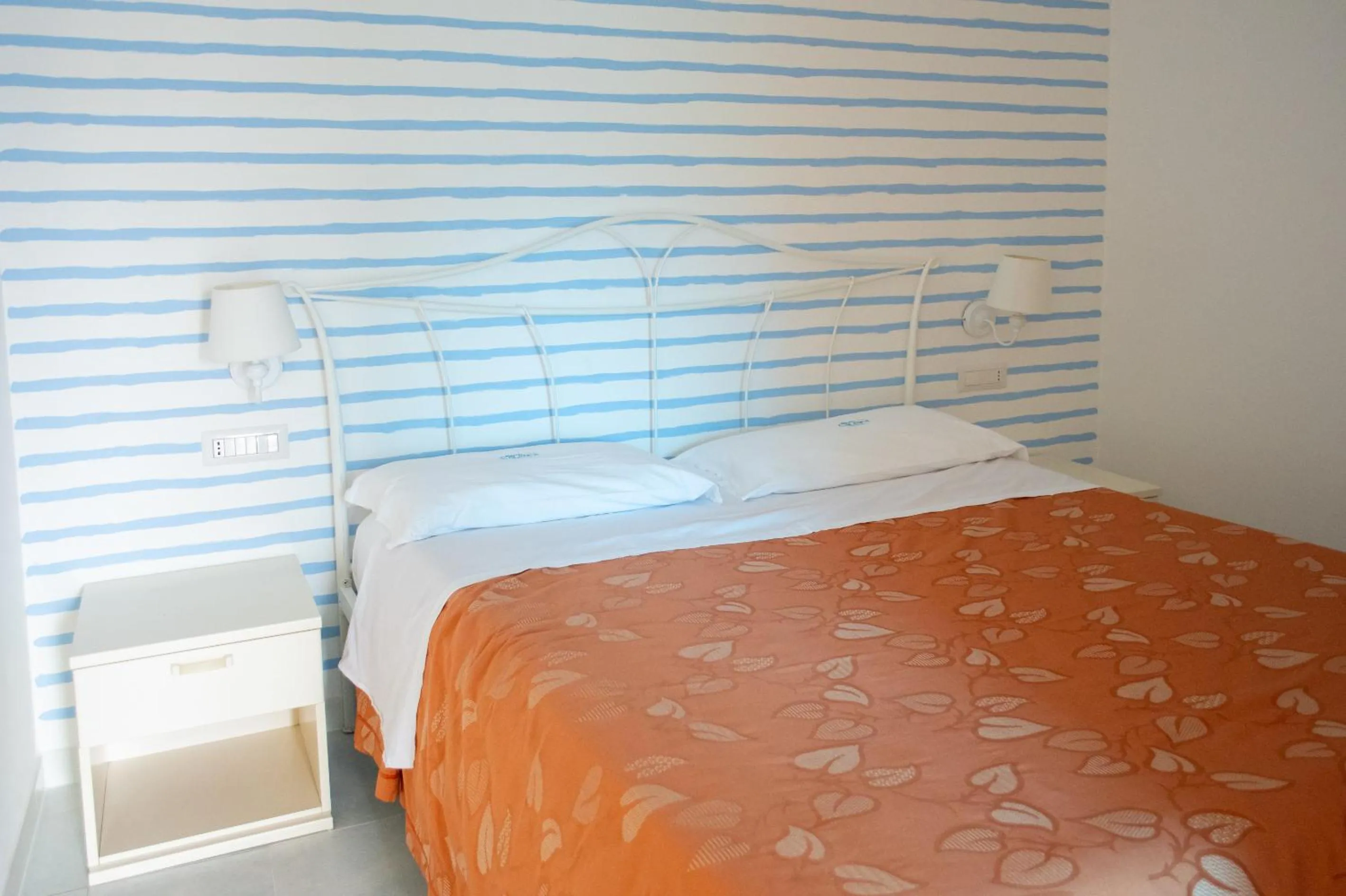 Bed in Hotel Calanca