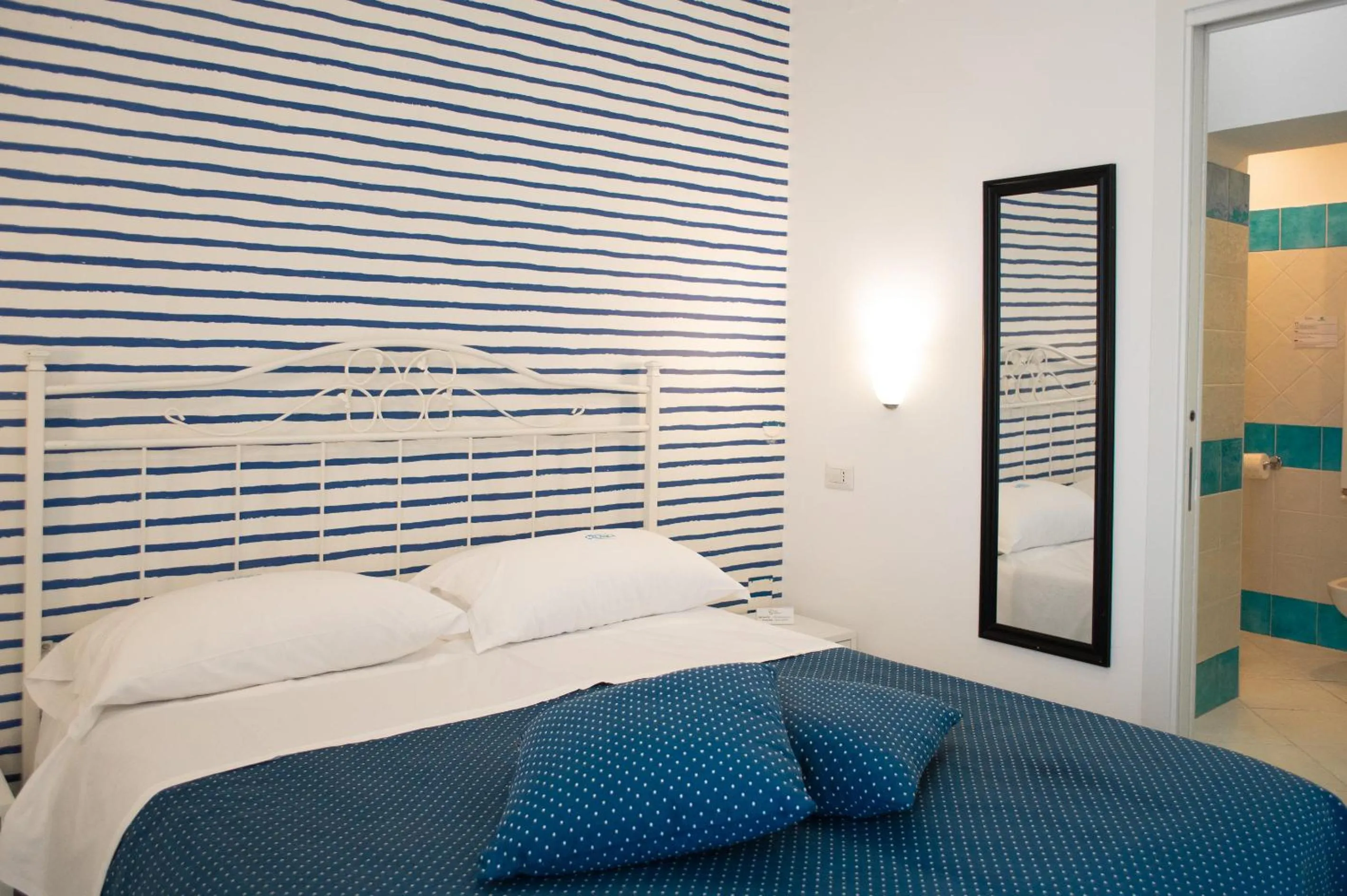 Bed in Hotel Calanca