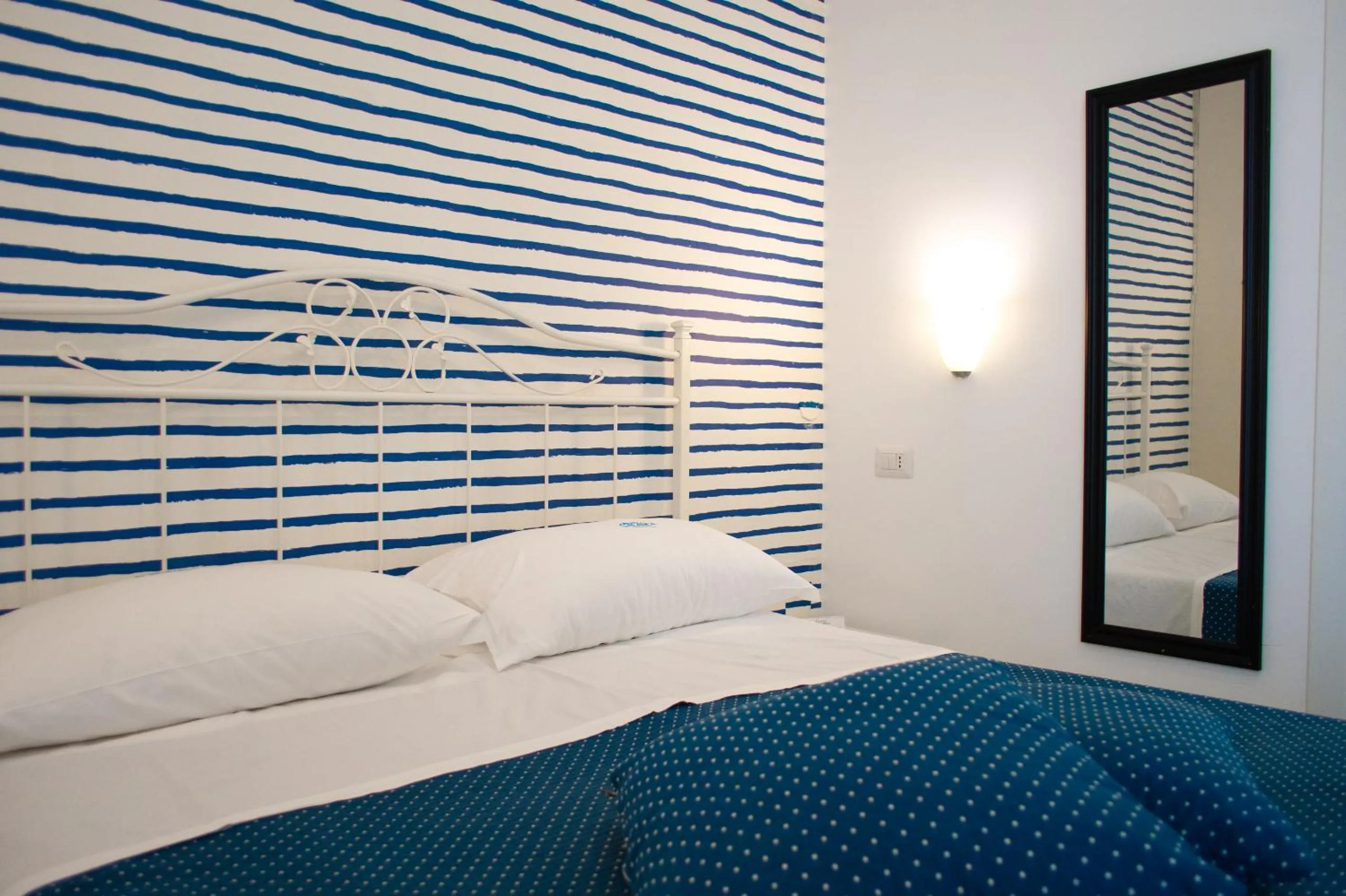 Bed in Hotel Calanca