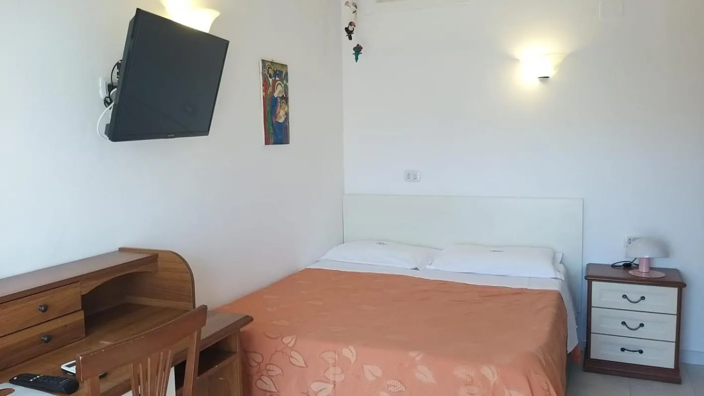 Bed in Hotel Calanca