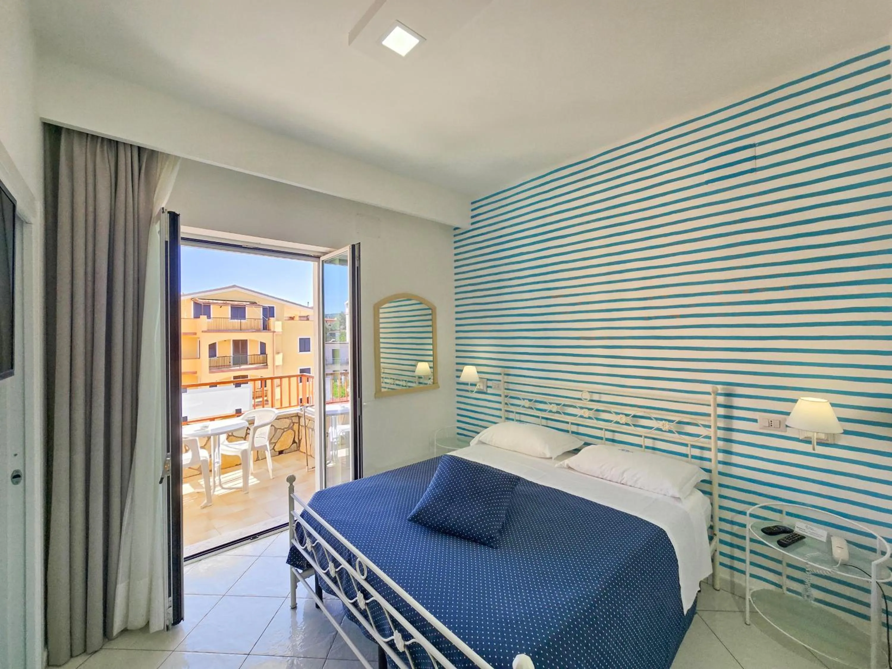 View (from property/room), Bed in Hotel Calanca