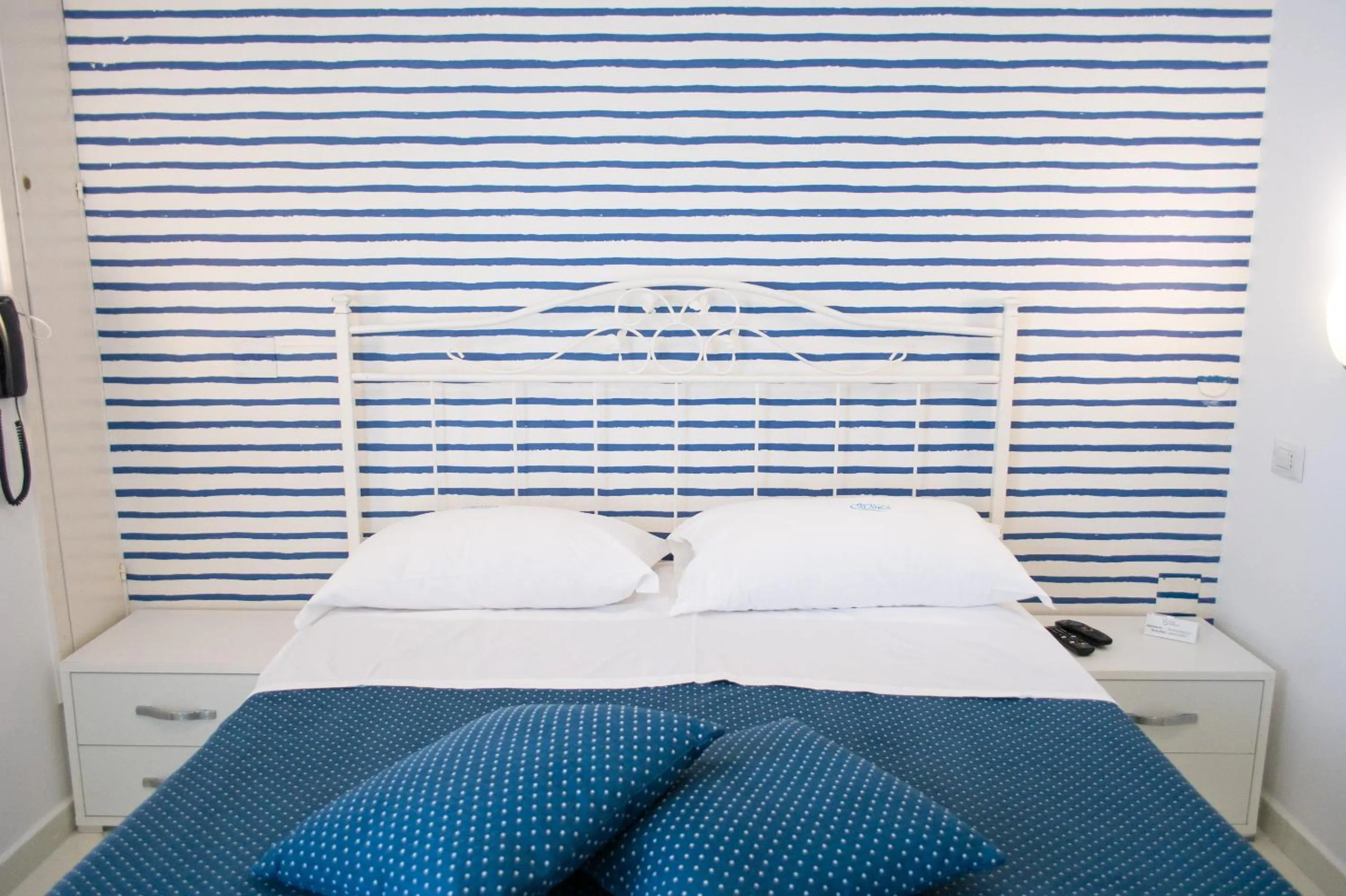 Bed in Hotel Calanca