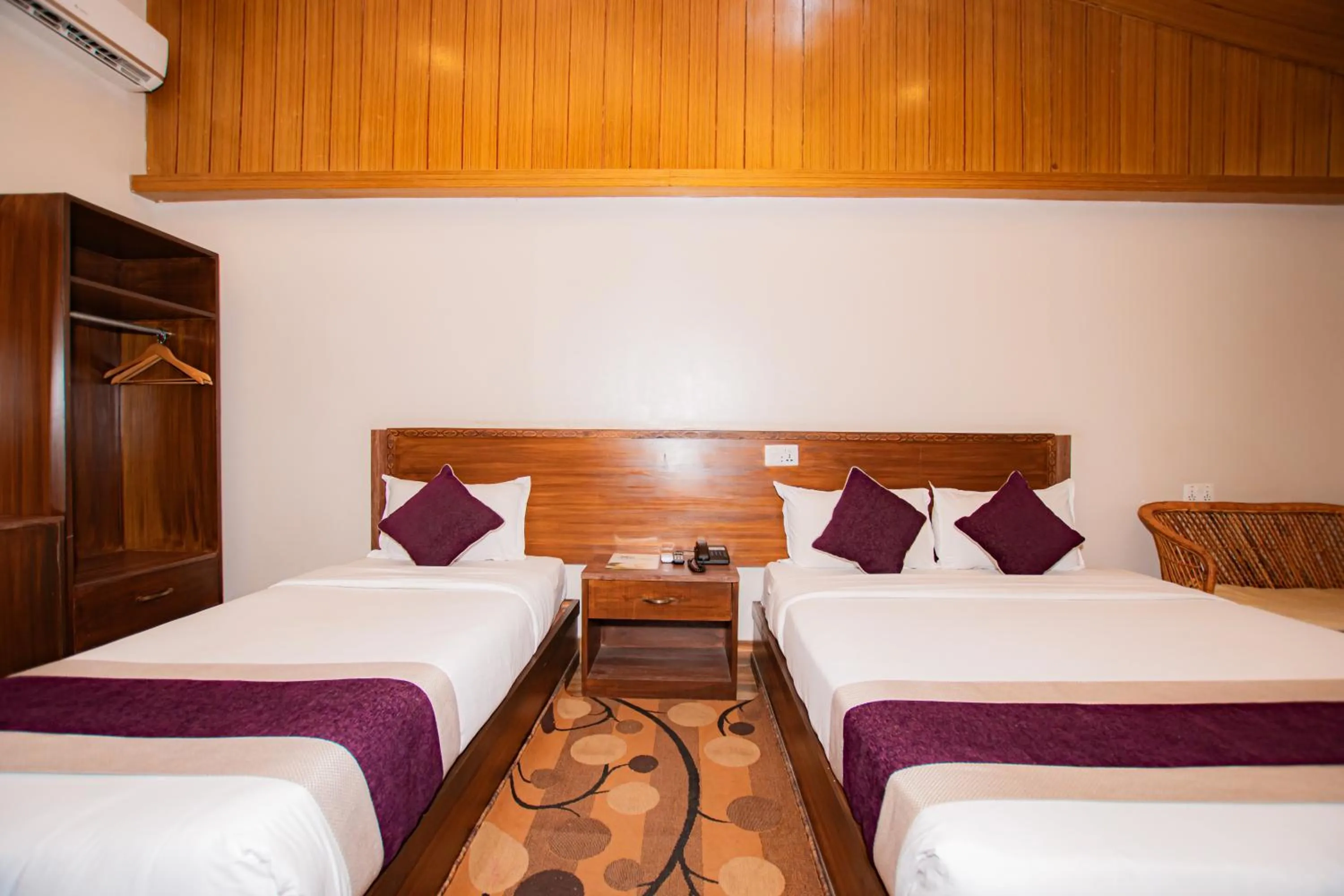 Bed in Busy Bee Resort, Pokhara