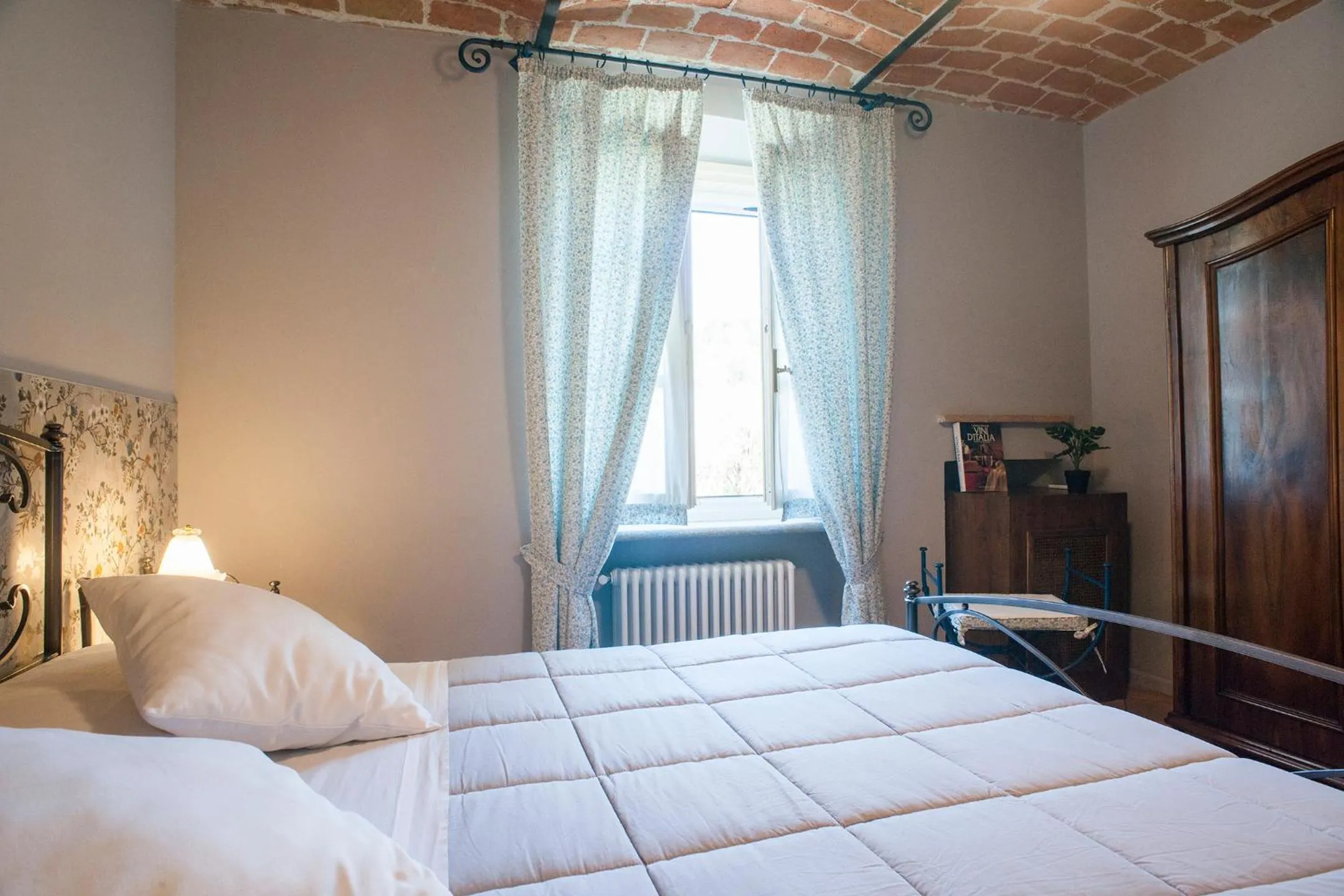Bed in La Giribaldina Winery & Farmhouse
