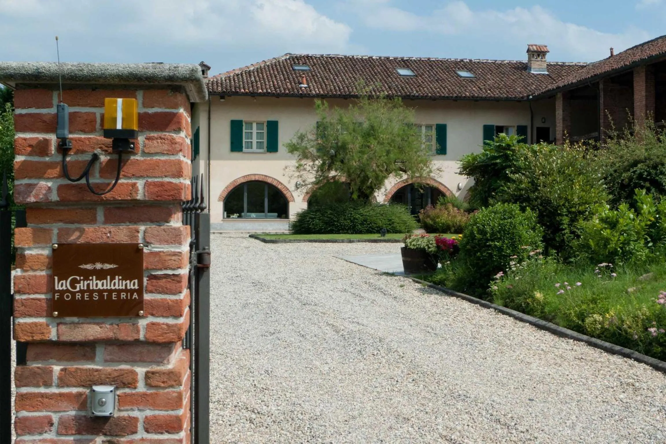 Property logo or sign in La Giribaldina Winery & Farmhouse