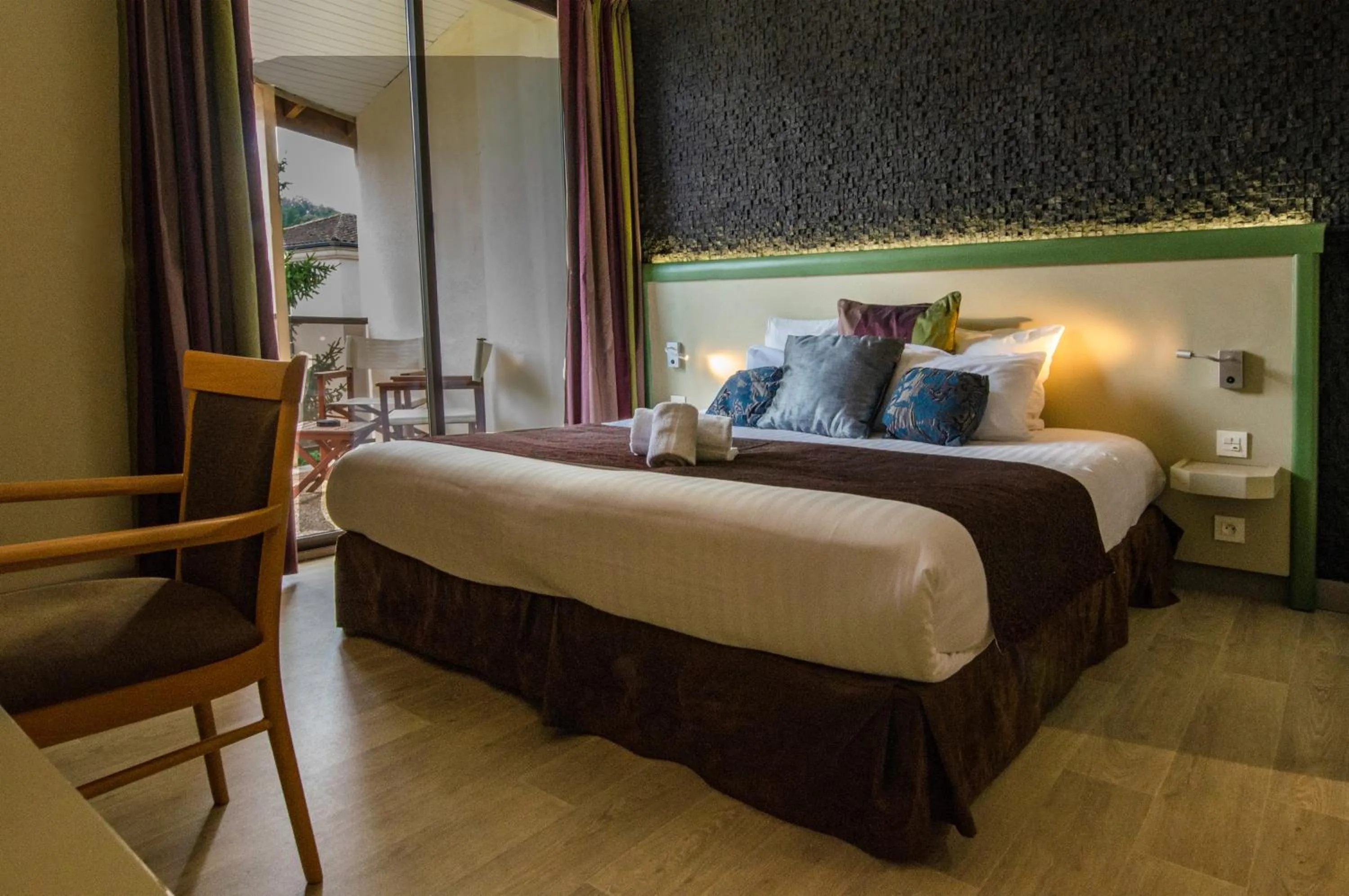 Bed in Au Grand Hôtel de Sarlat - Pavillon de SELVES