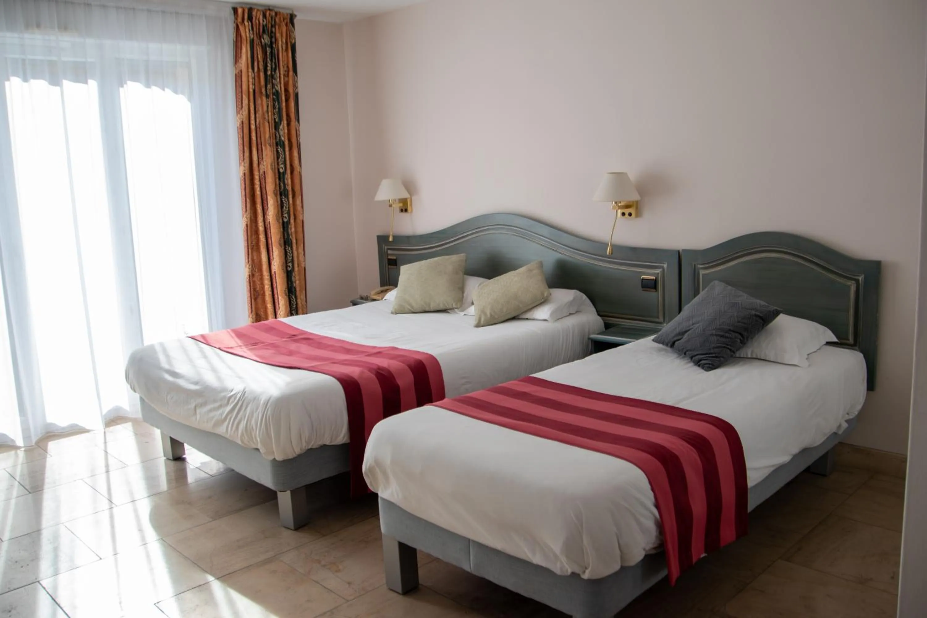 Bed in Logis Le Saint Nicolas