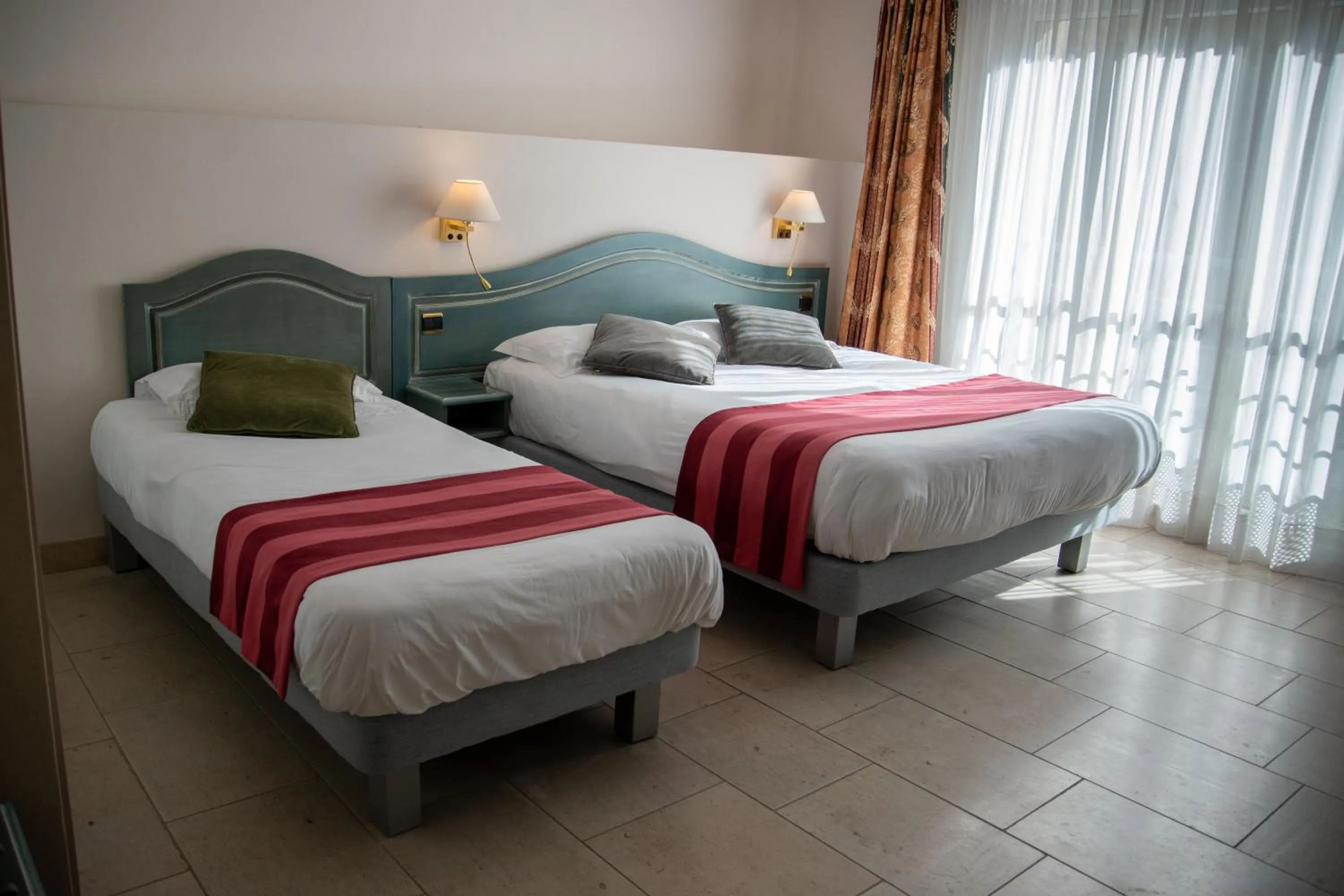 Bed in Logis Le Saint Nicolas