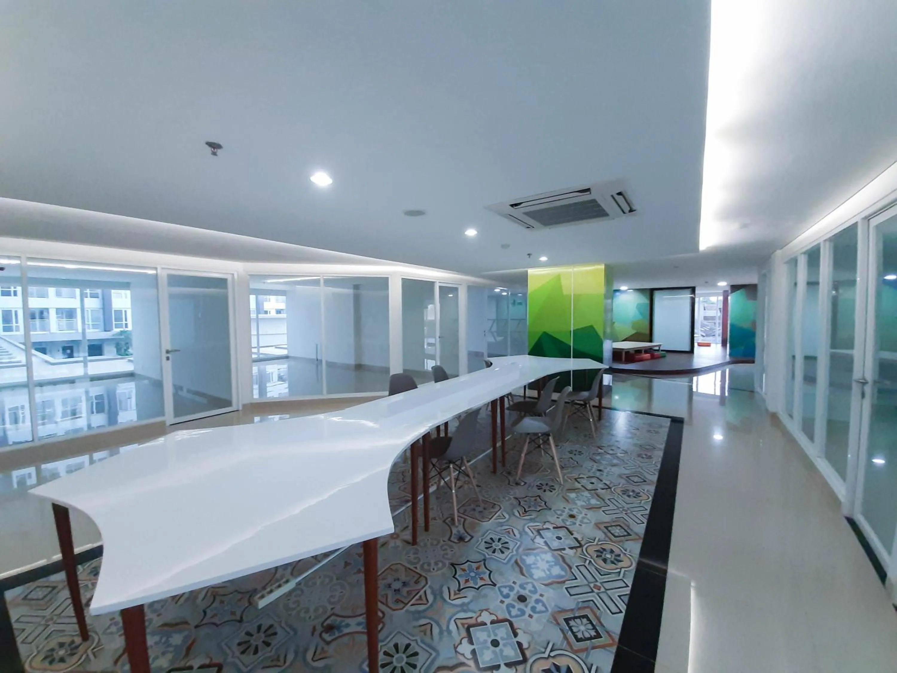 Communal lounge/ TV room in Apartemen Taman Melati Sinduadi By NGINAP