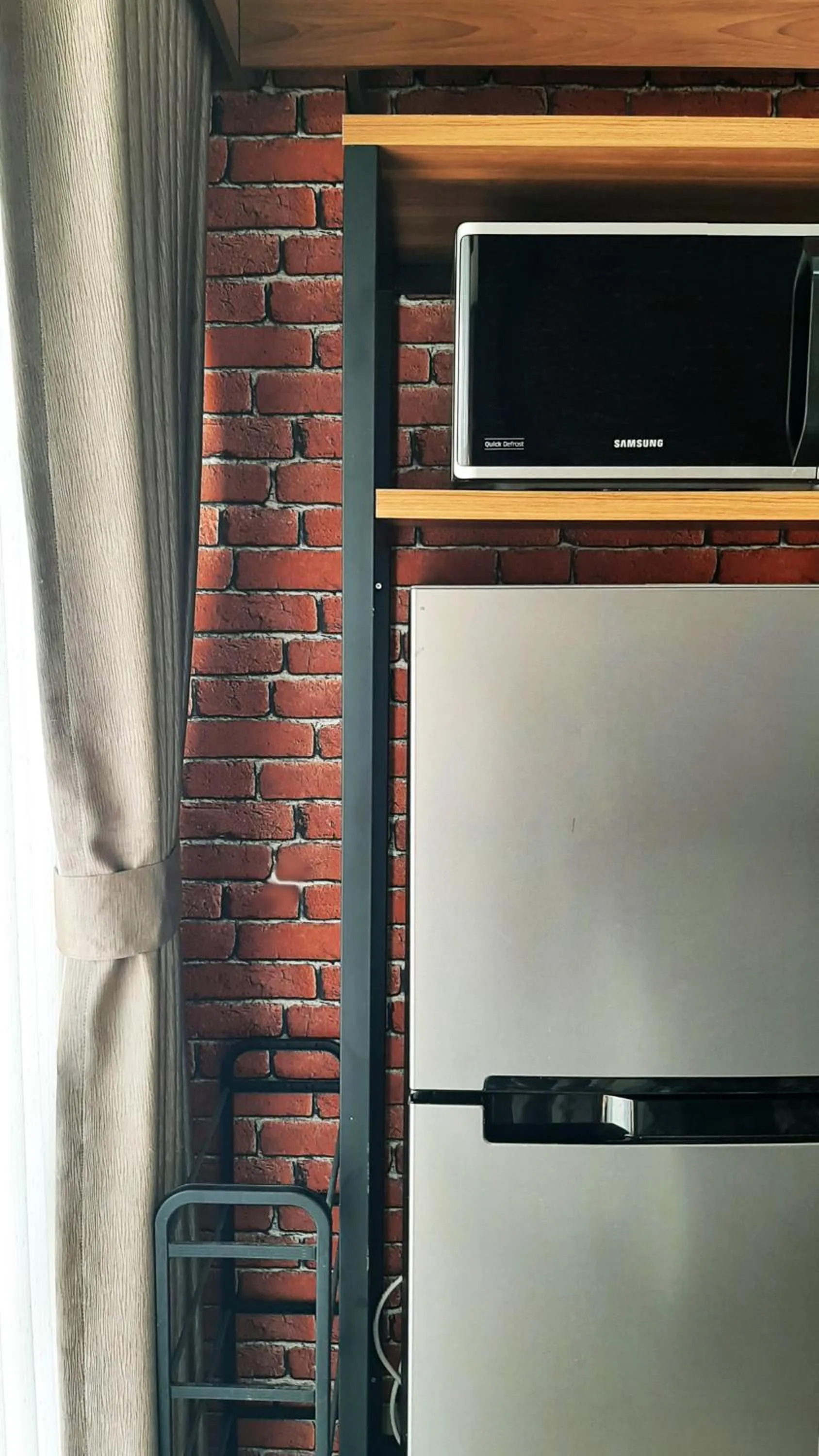 minibar in Apartemen Taman Melati Sinduadi By NGINAP