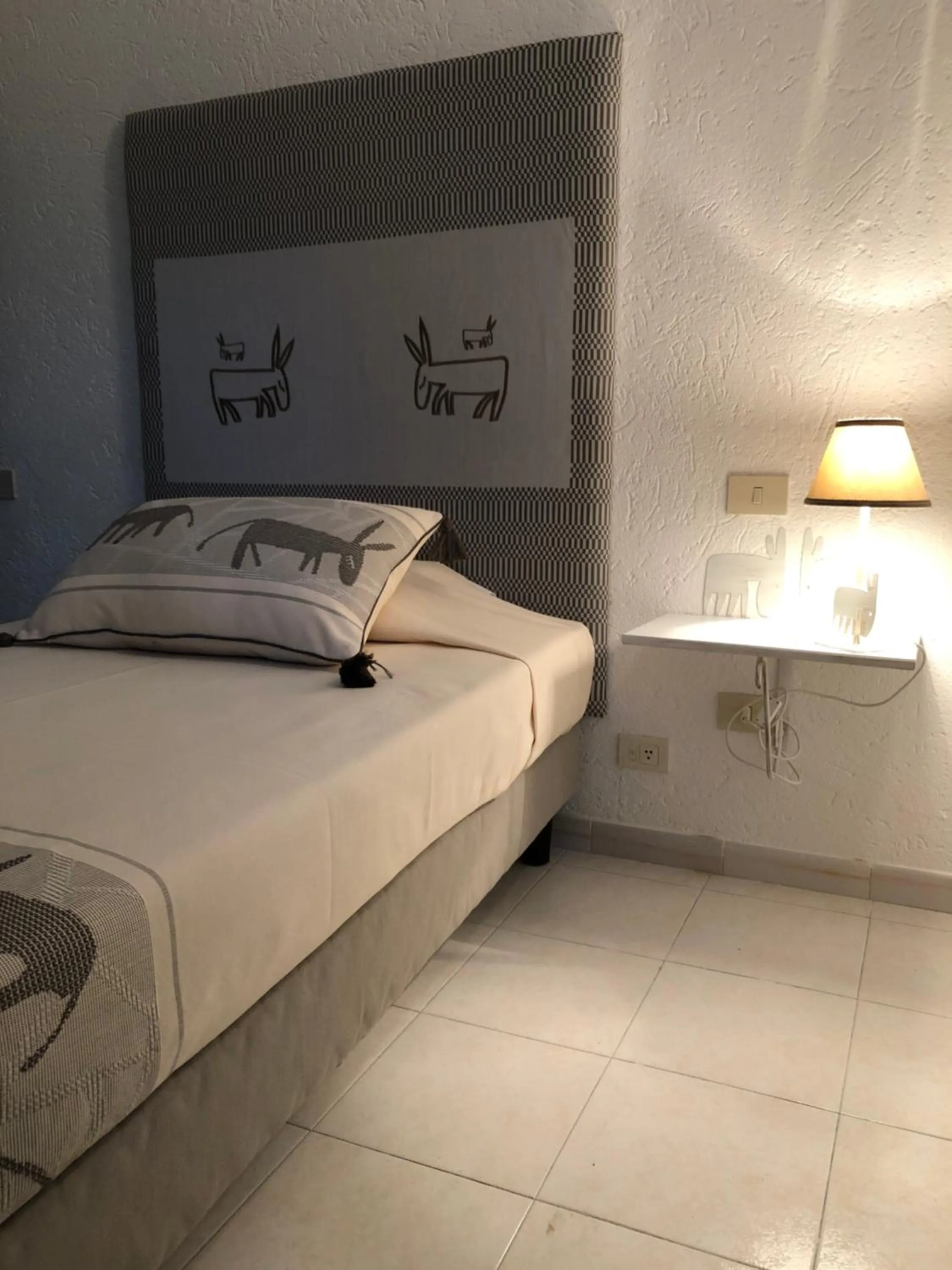 Bed in Hotel Canne al Vento