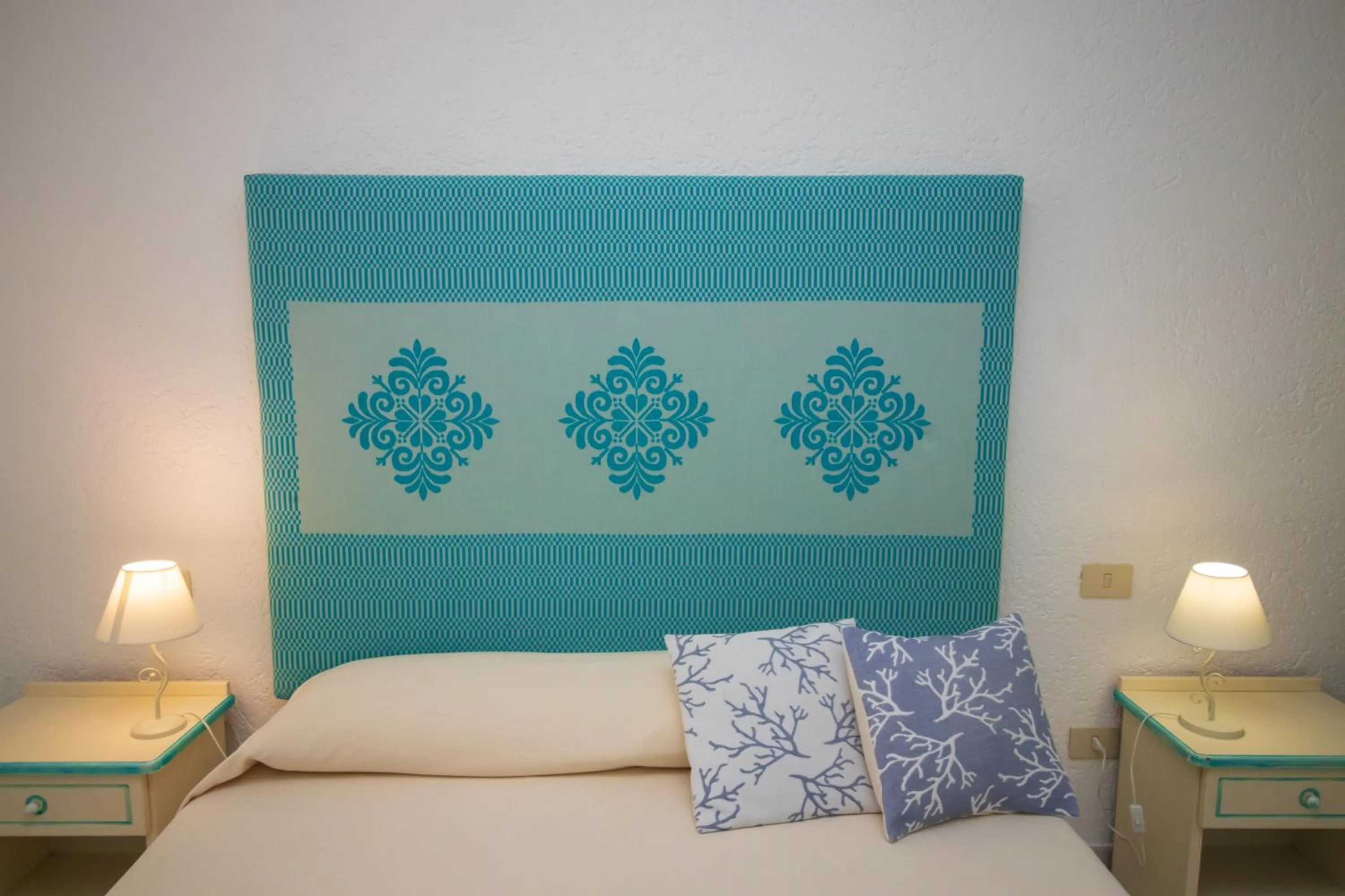 Bed in Hotel Canne al Vento