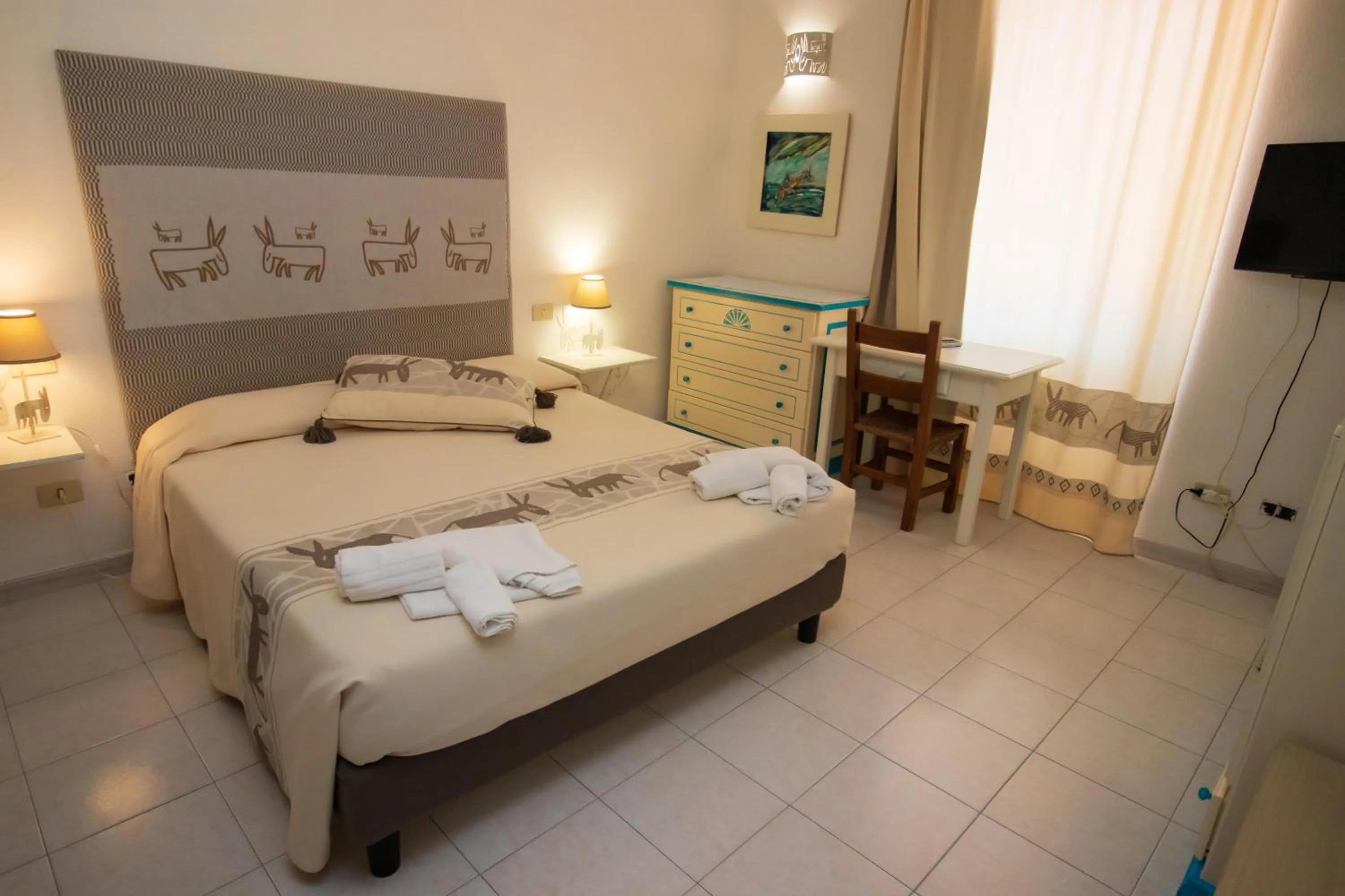 Bed in Hotel Canne al Vento