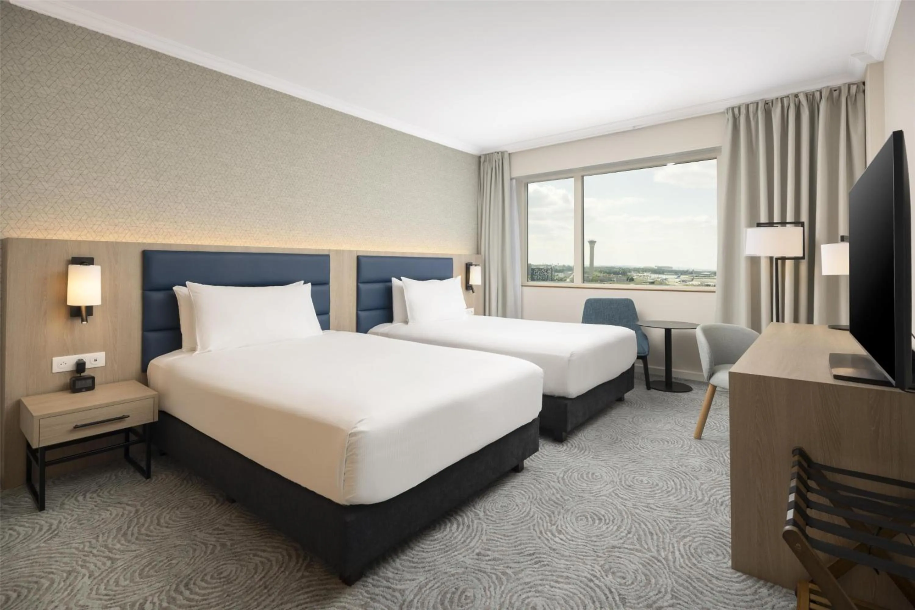 Bed in Hilton Paris Charles De Gaulle Airport