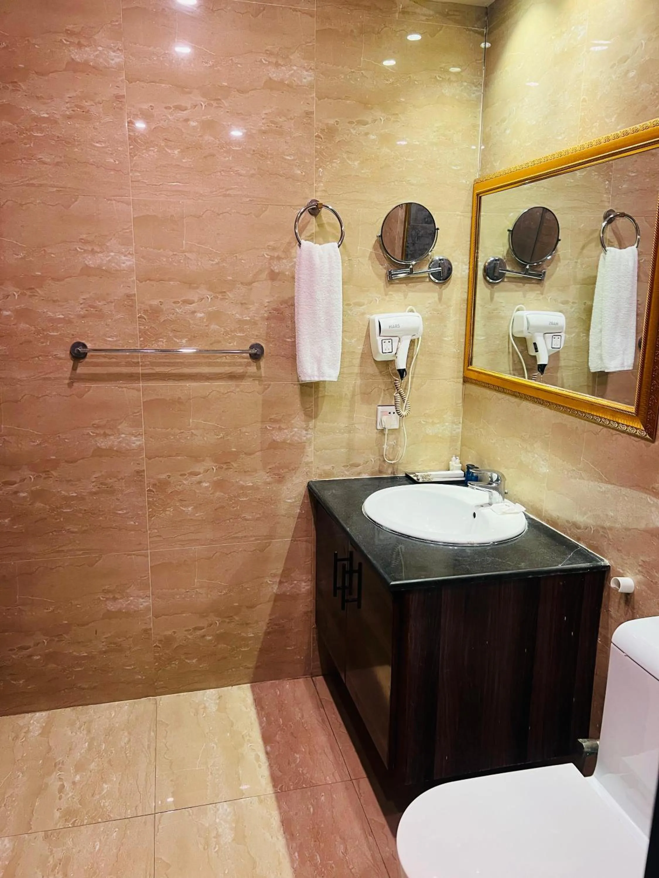 Bathroom in Grand Regent Hotel and Suites