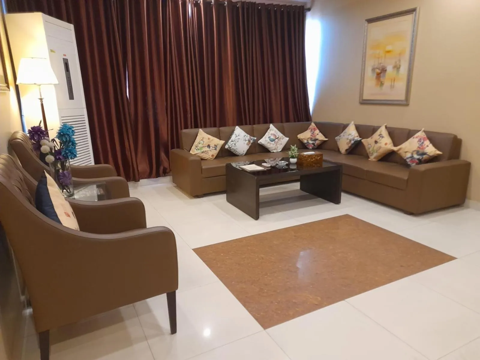 Seating area in Grand Regent Hotel and Suites