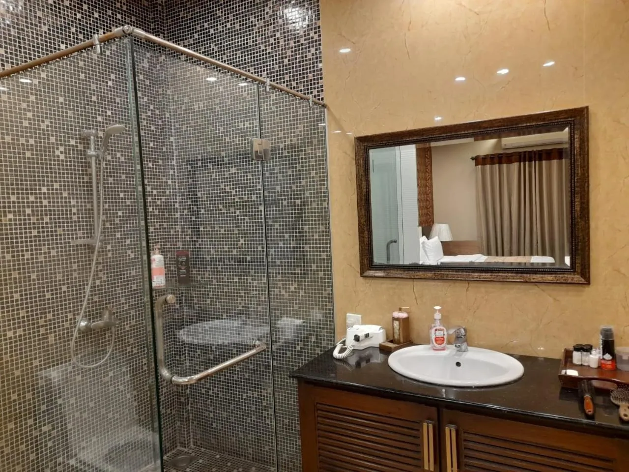 Shower in Grand Regent Hotel and Suites