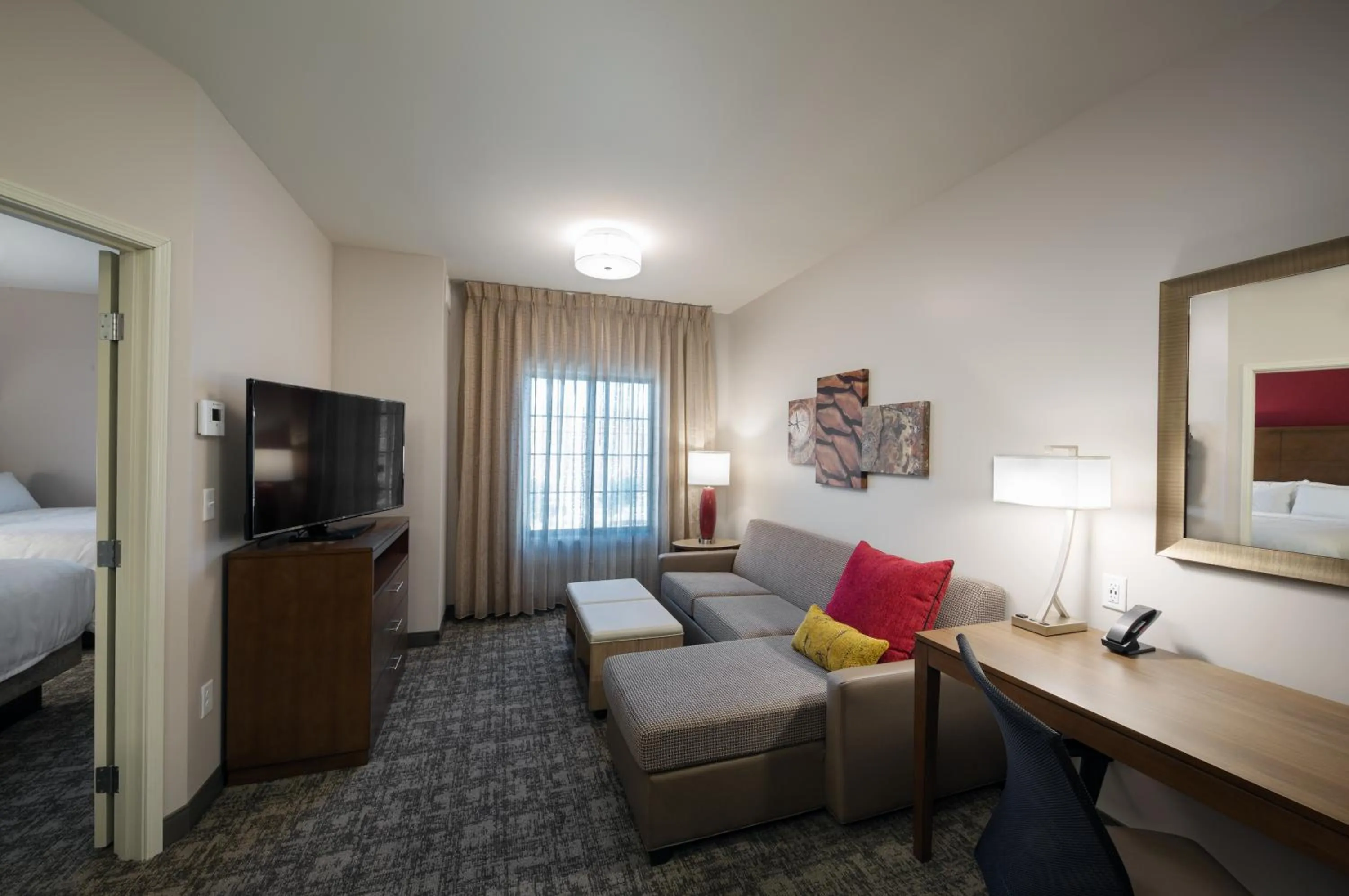 Living room, Bed in Staybridge Suites - Phoenix – Biltmore Area by IHG
