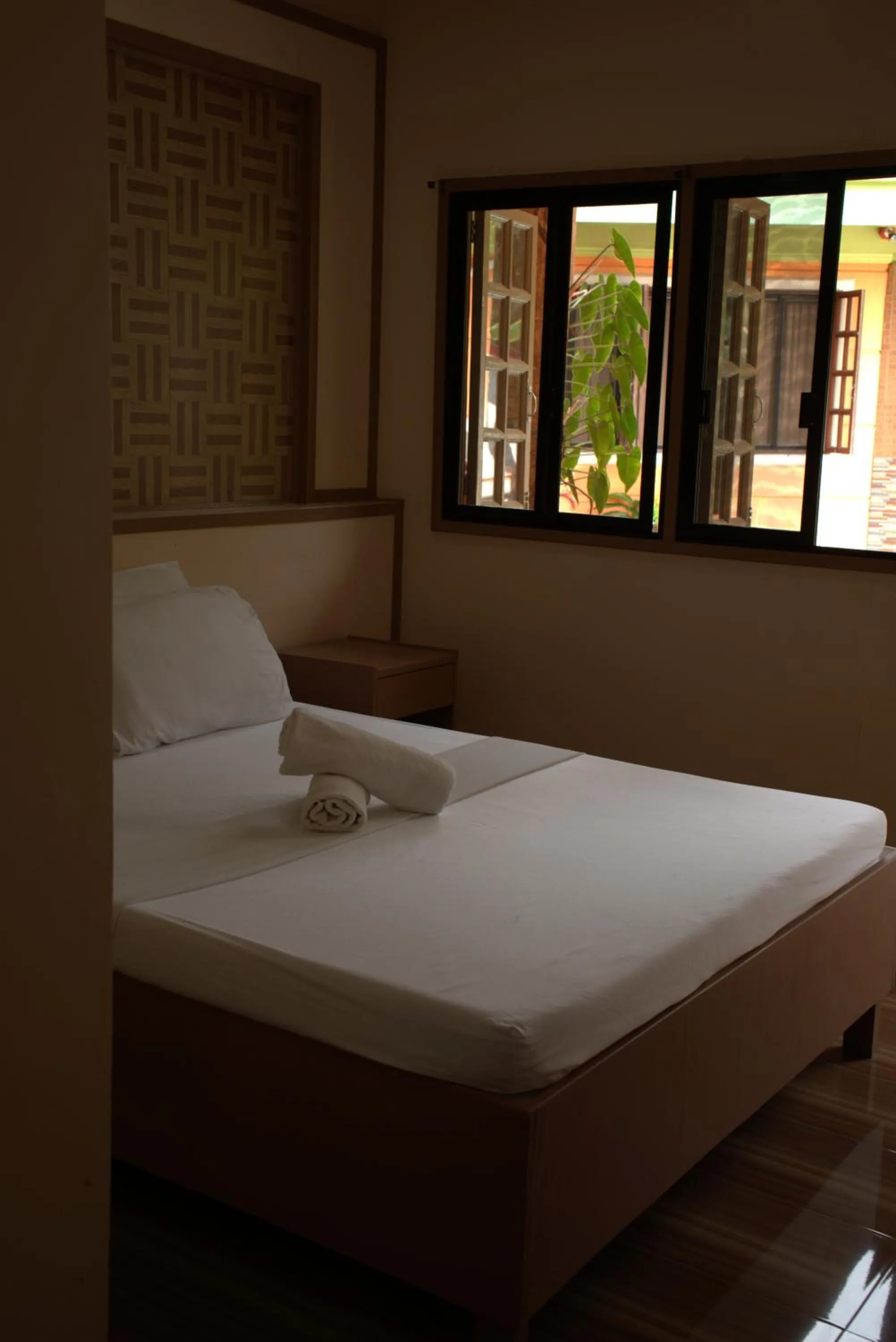 Bed in Stefanie Grace Inn