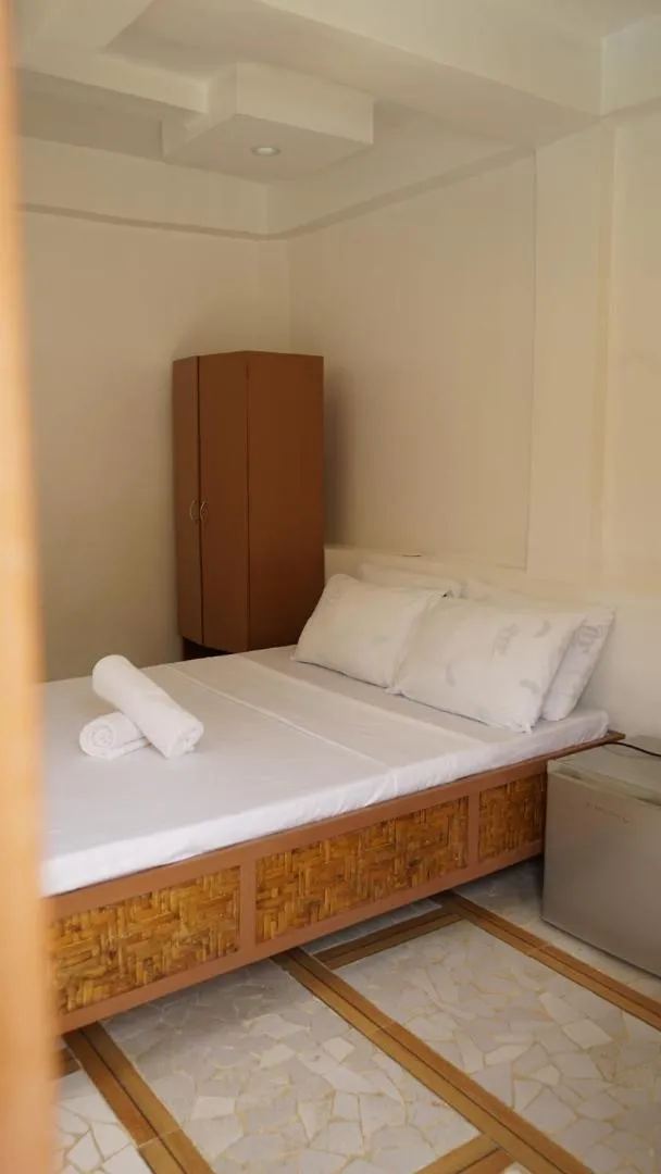 Bed in Stefanie Grace Inn