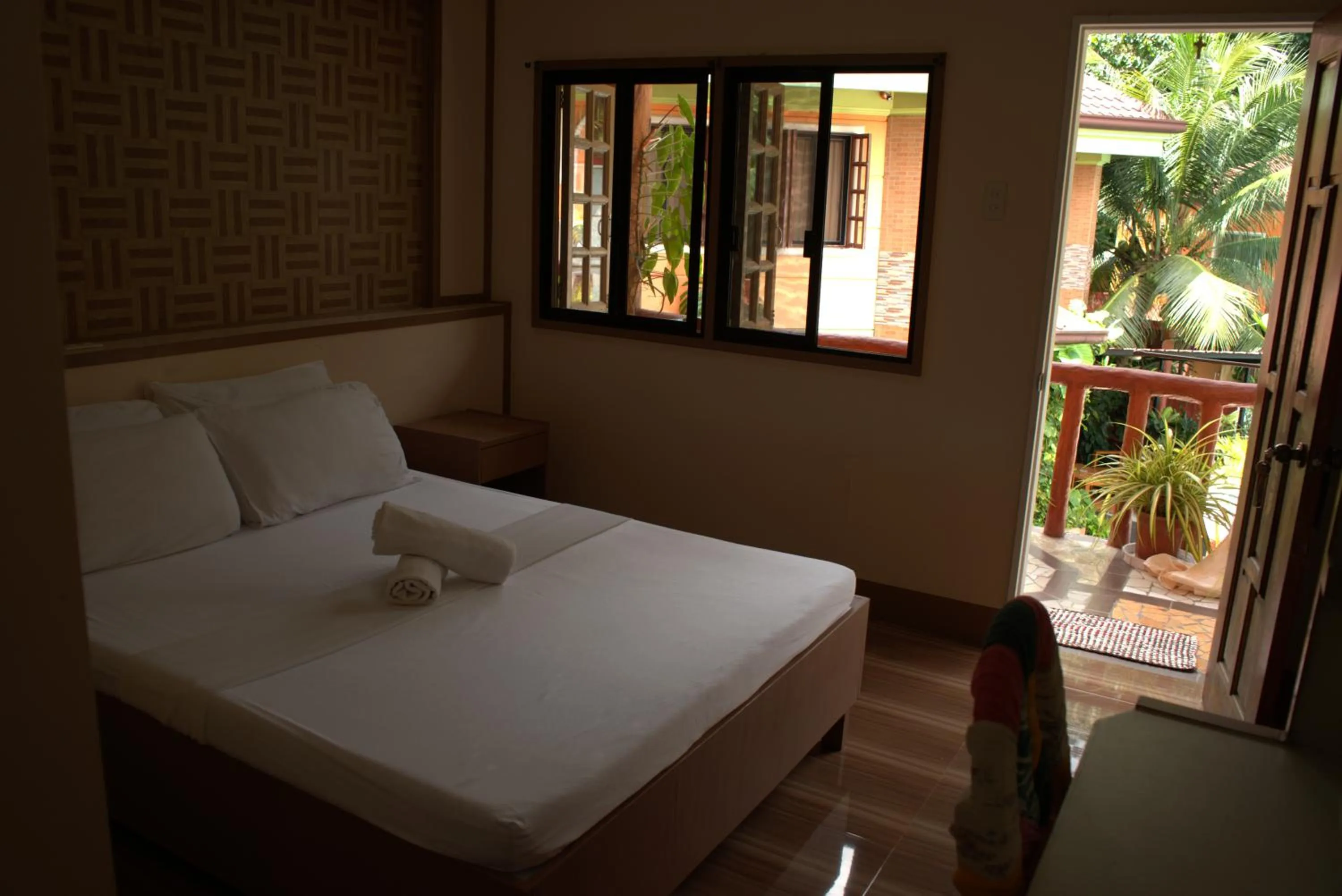 Bed in Stefanie Grace Inn