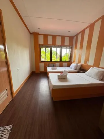 Bed in Stefanie Grace Inn