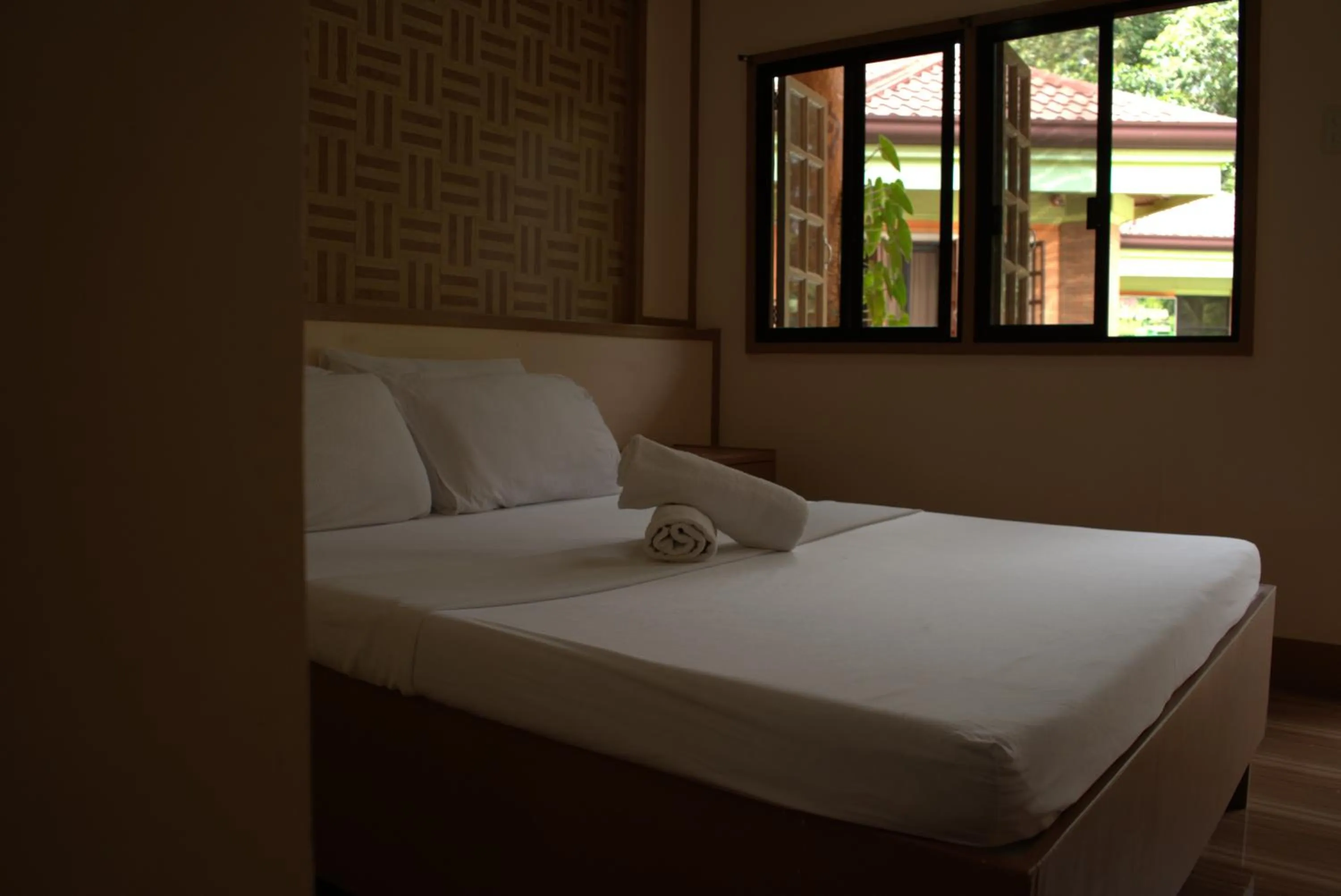 Bed in Stefanie Grace Inn