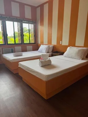 Bed in Stefanie Grace Inn