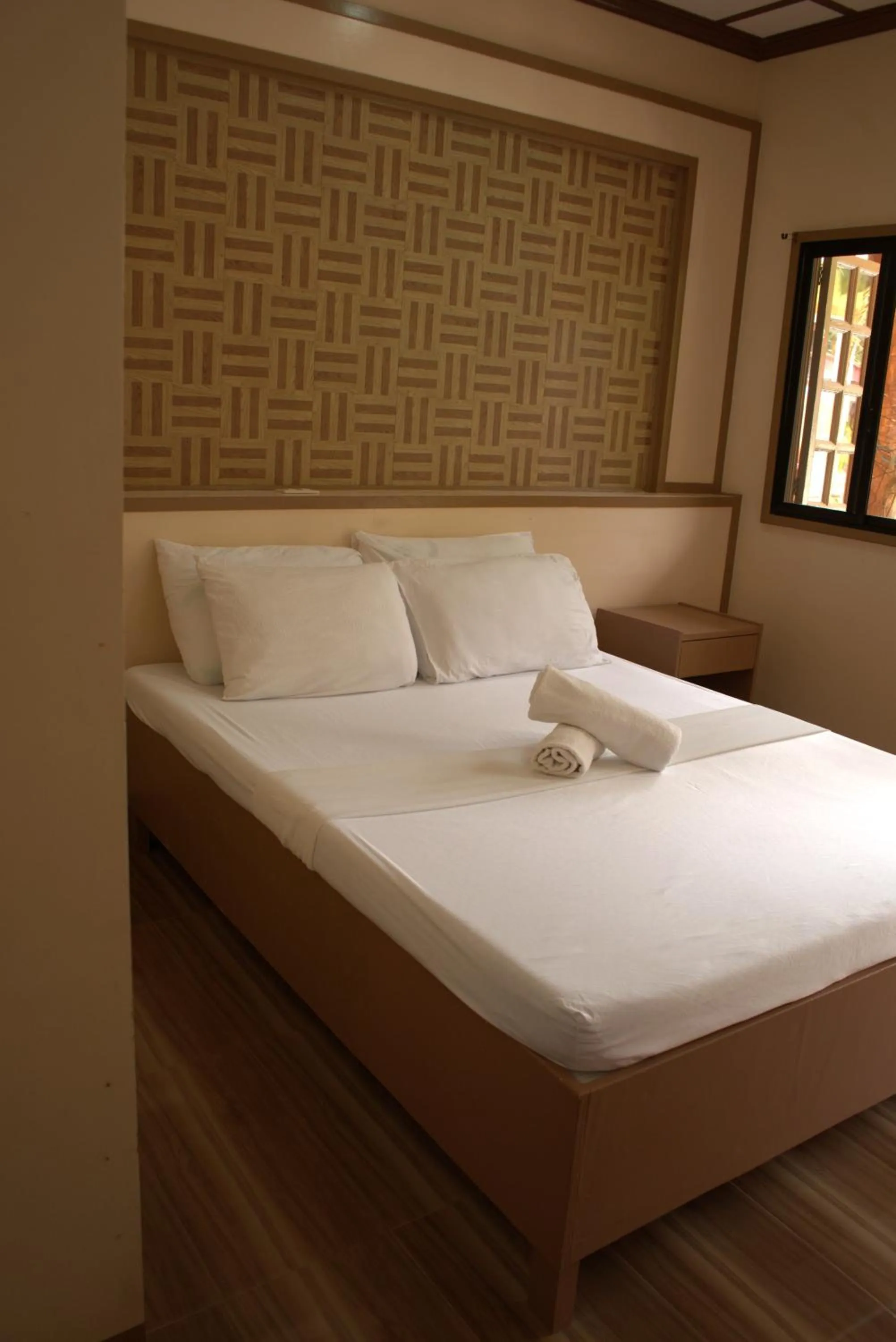 Bed in Stefanie Grace Inn