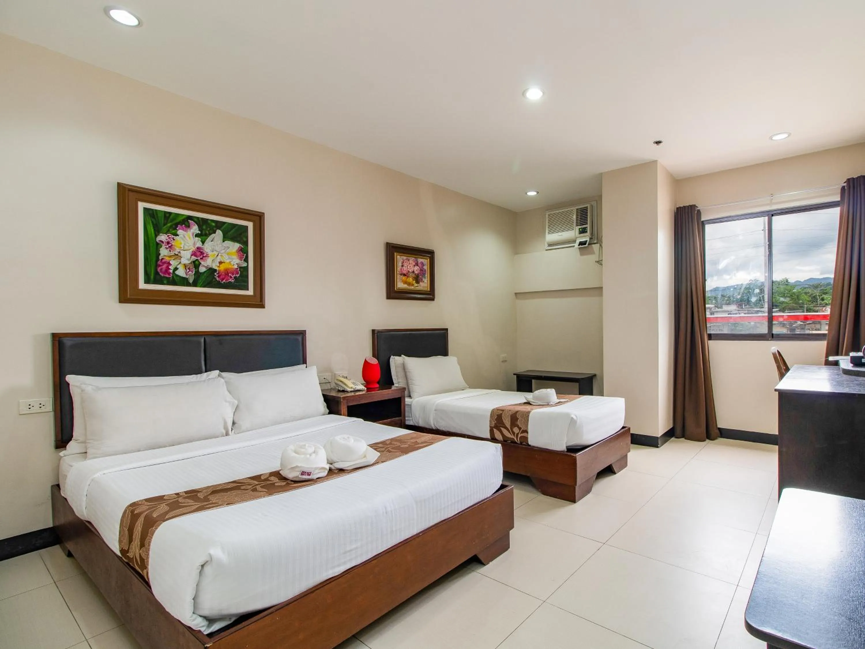 Bed in Main Hotel & Suites