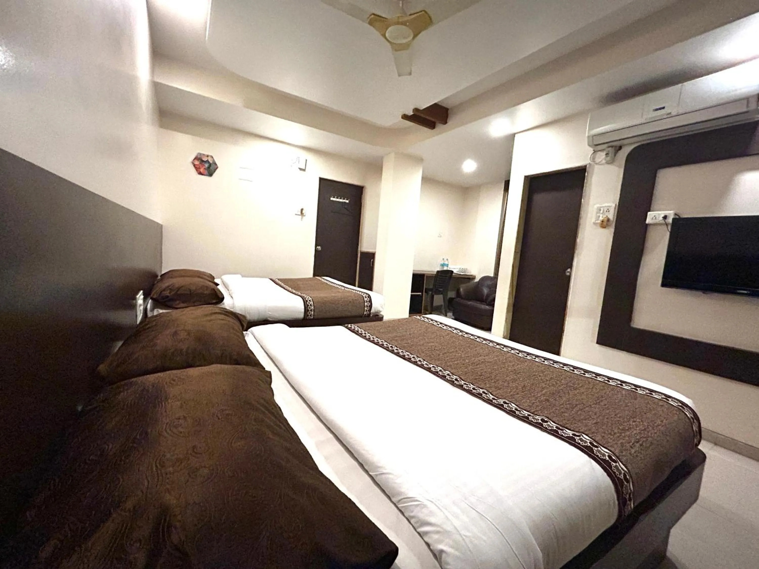 Photo of the whole room, Bed in Hotel Krishna Sai Kutir