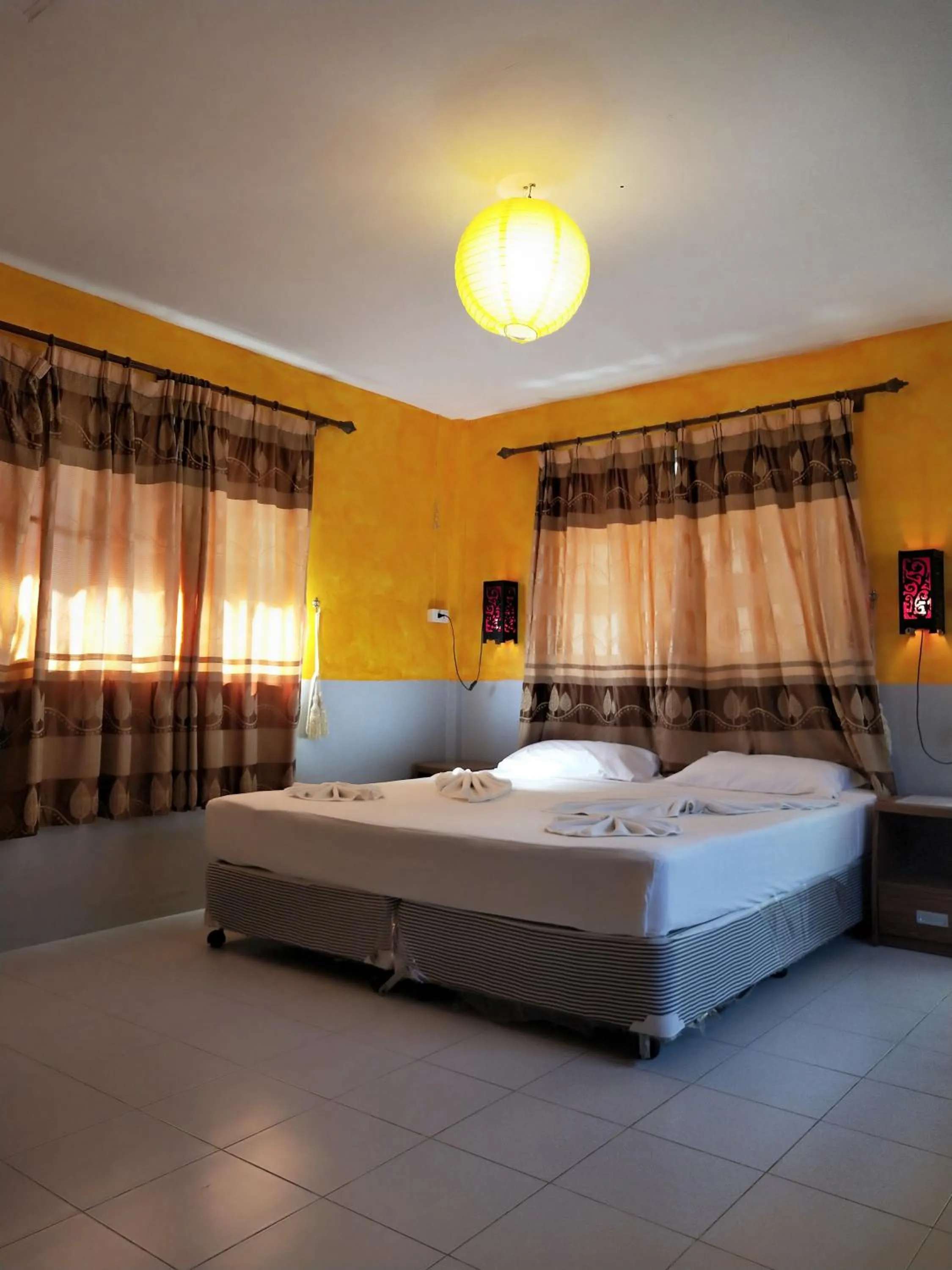 Bed in Ban Elephant Blanc Bungalow