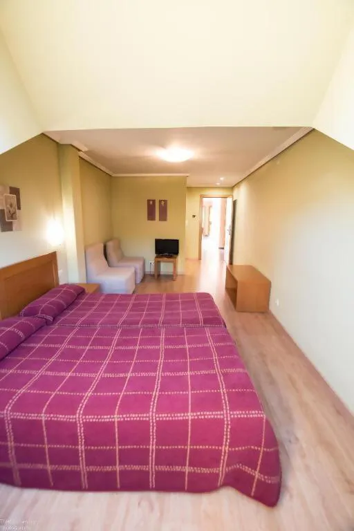 Bed in HOTEL EL ROBLE PALENTINO