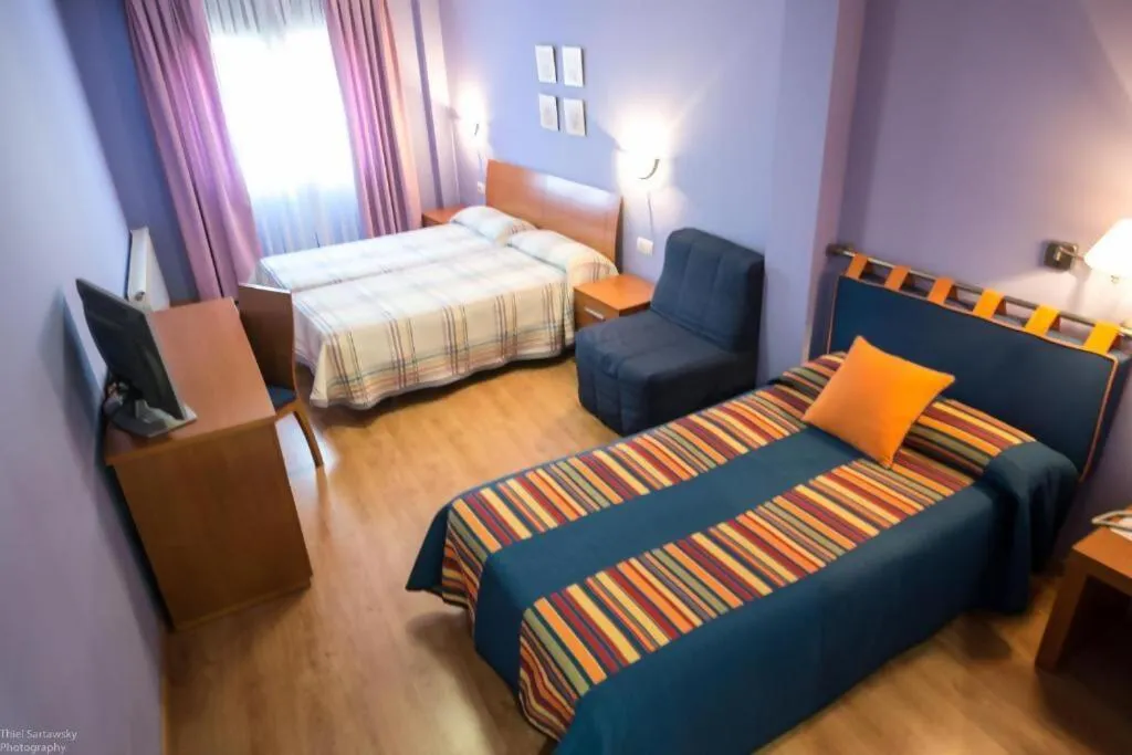 Bed in HOTEL EL ROBLE PALENTINO