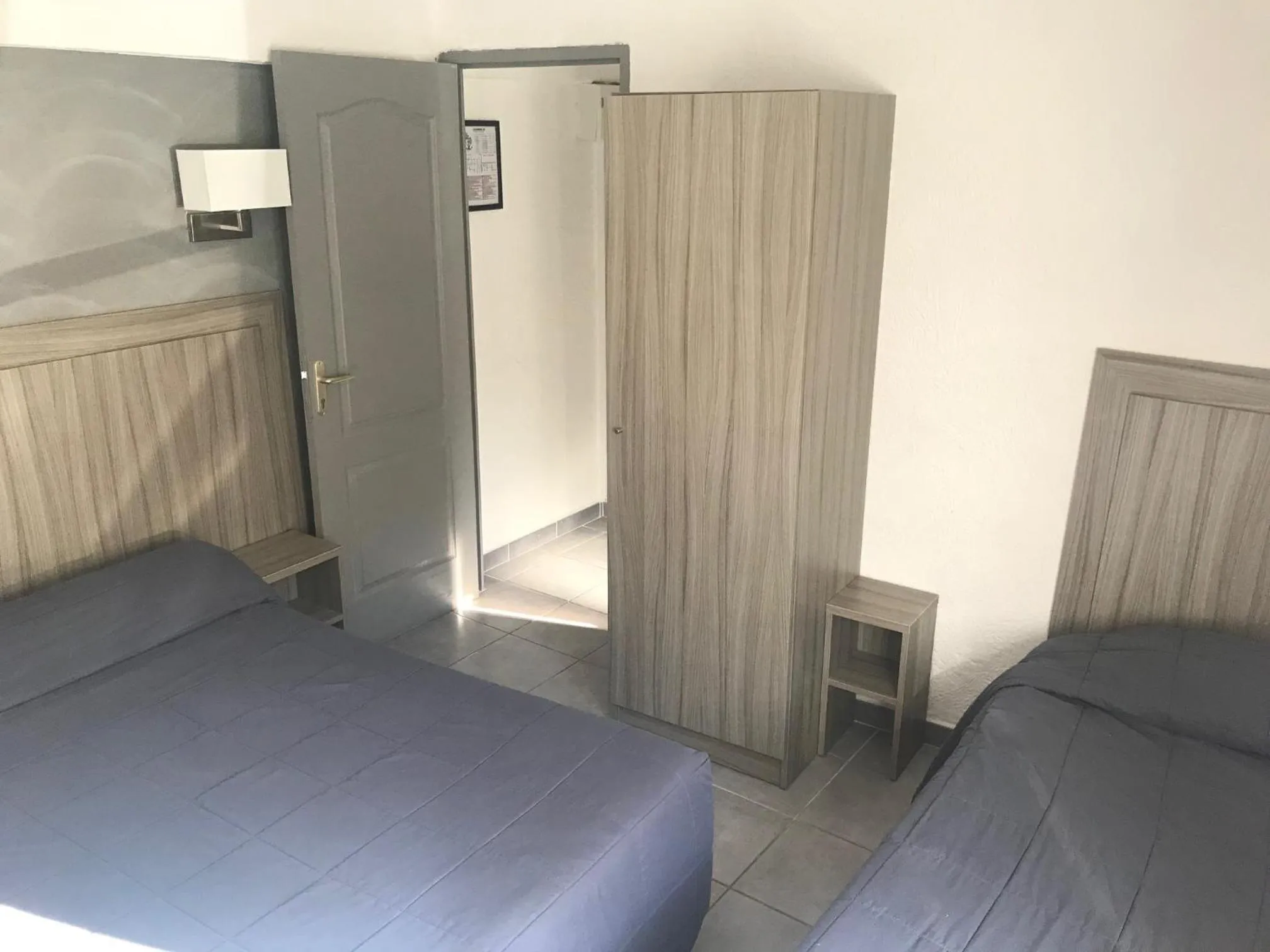 Bed in Hotel Les Palmiers En Camargue