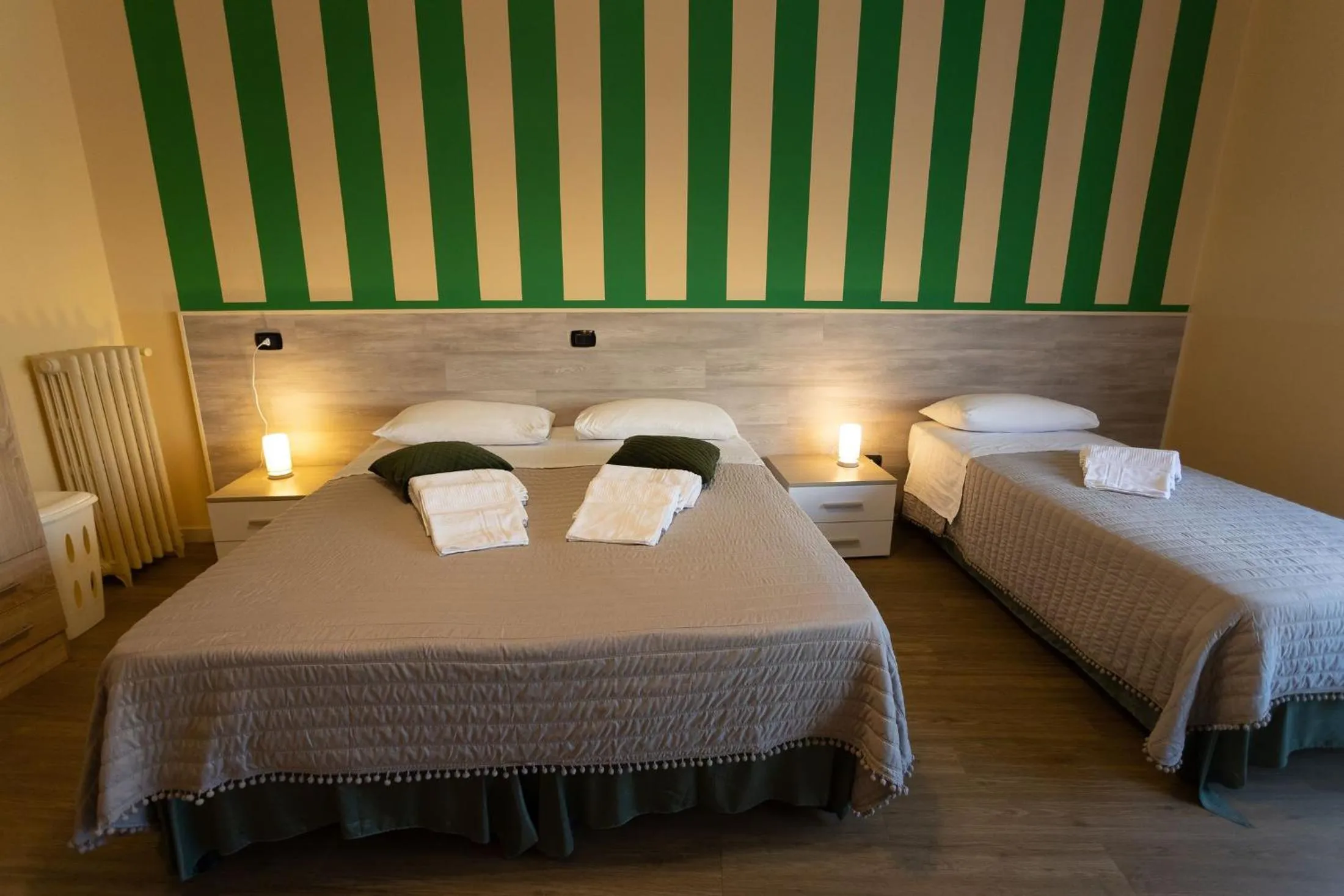 Bed in L'OPERA ROOMS