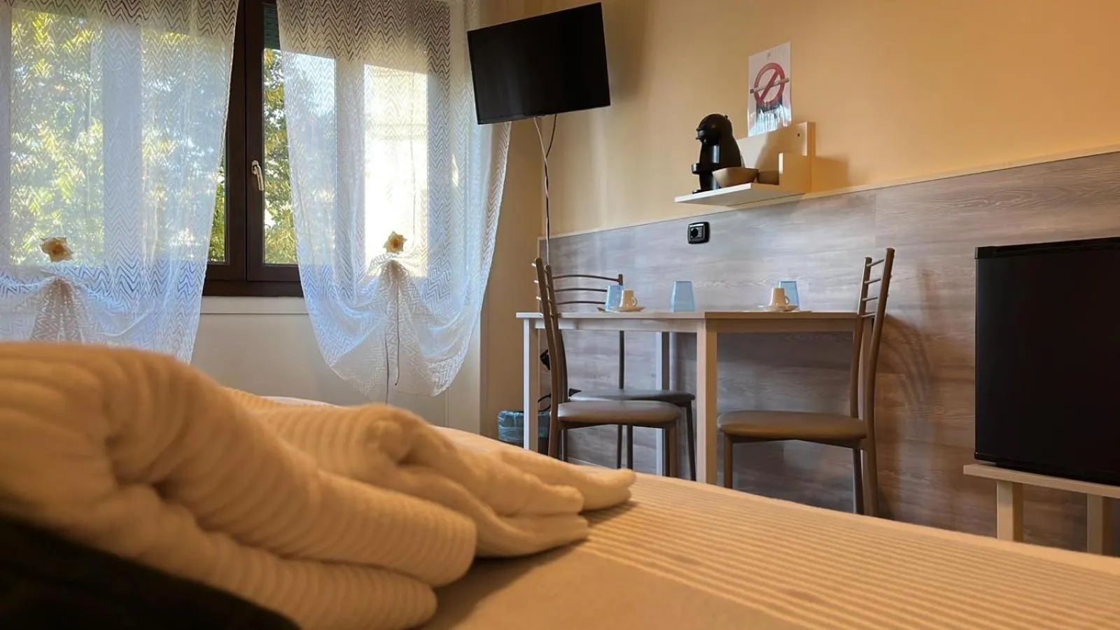 Bed in L'OPERA ROOMS